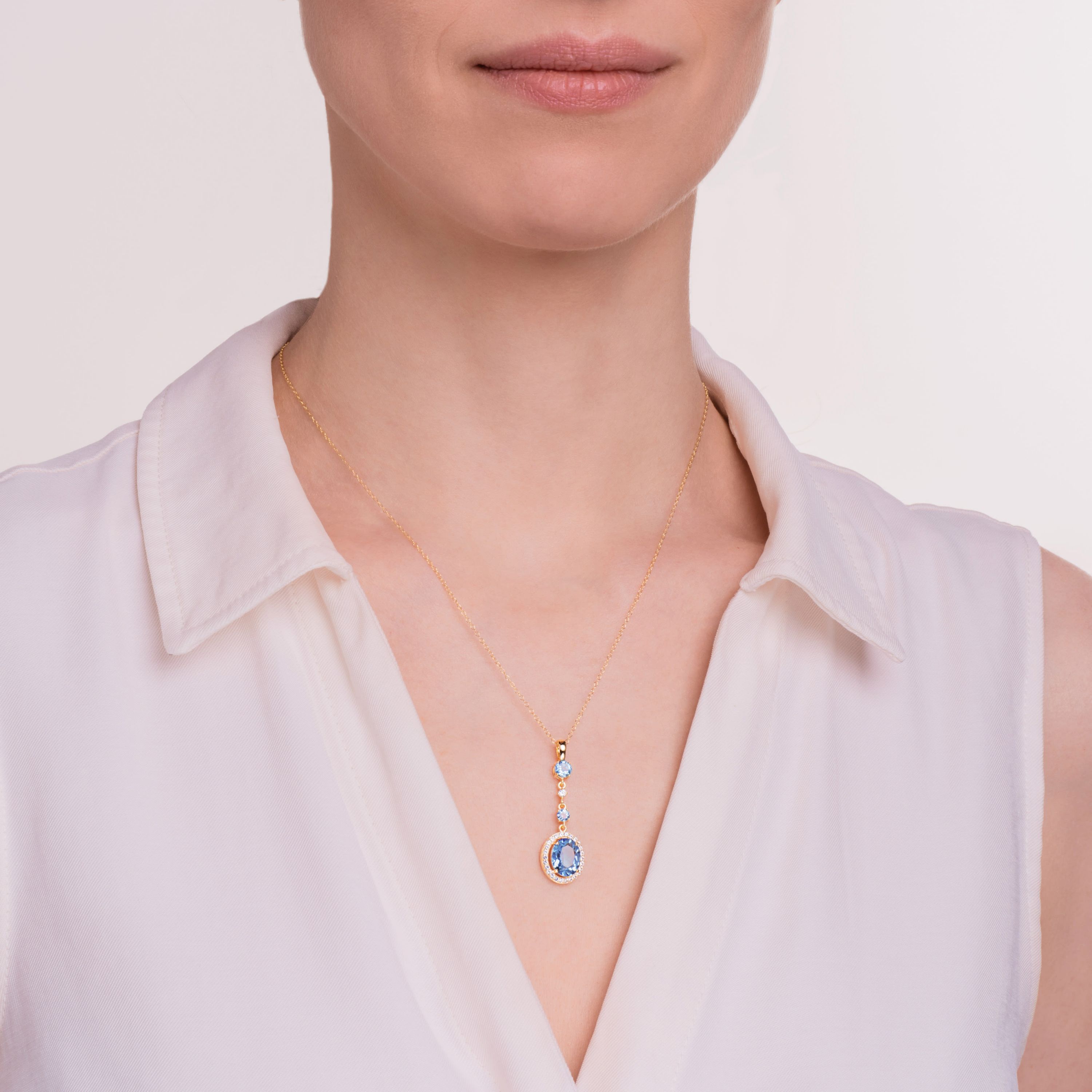 Genuine Blue Topaz and Created White Sapphire Pendant in 18K Gold-plated Sterling Silver