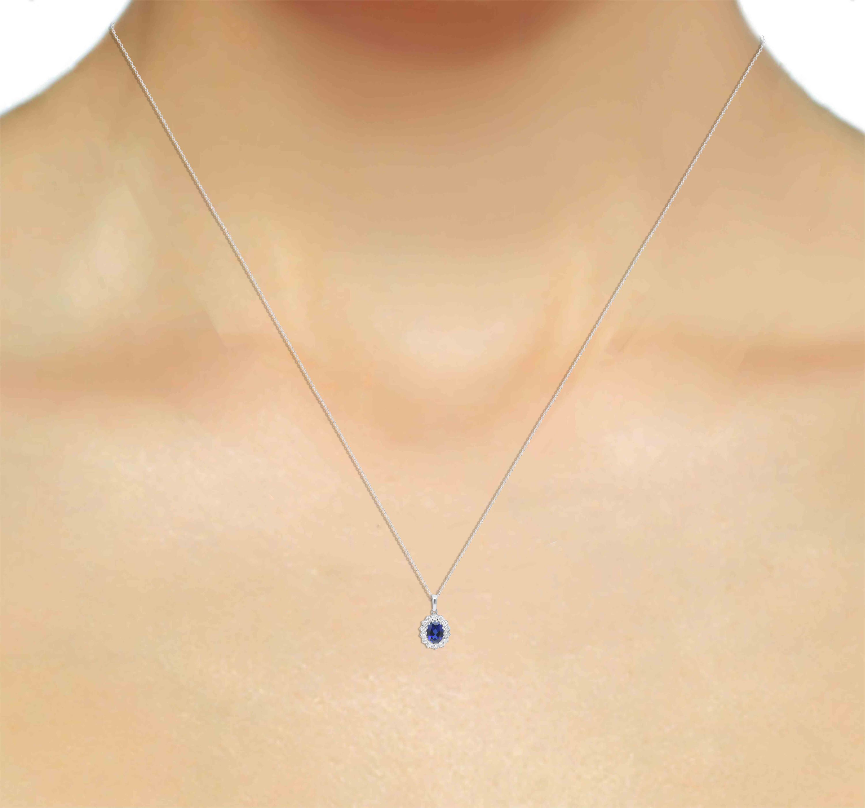 Lab Created 8X6 MM Oval Created Ruby and 1/2CTTW Lab Grown Diamond Pendant W/Chain.
