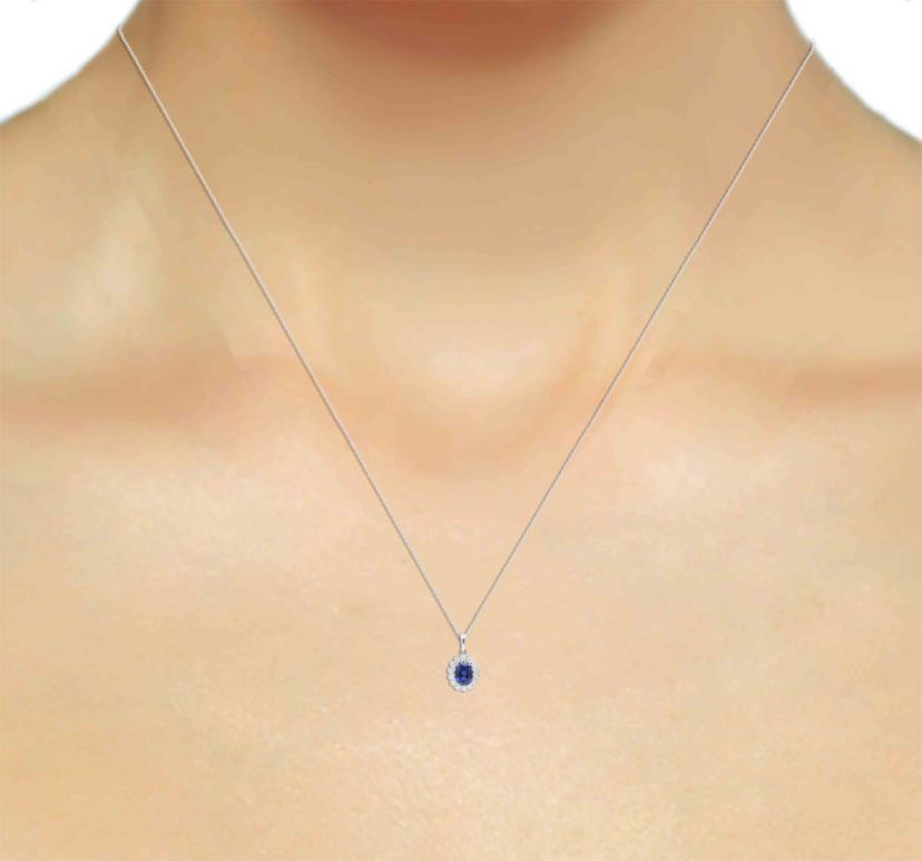 Lab Created 8X6 MM Oval Created Ruby and 1/2CTTW Lab Grown Diamond Pendant W/Chain.