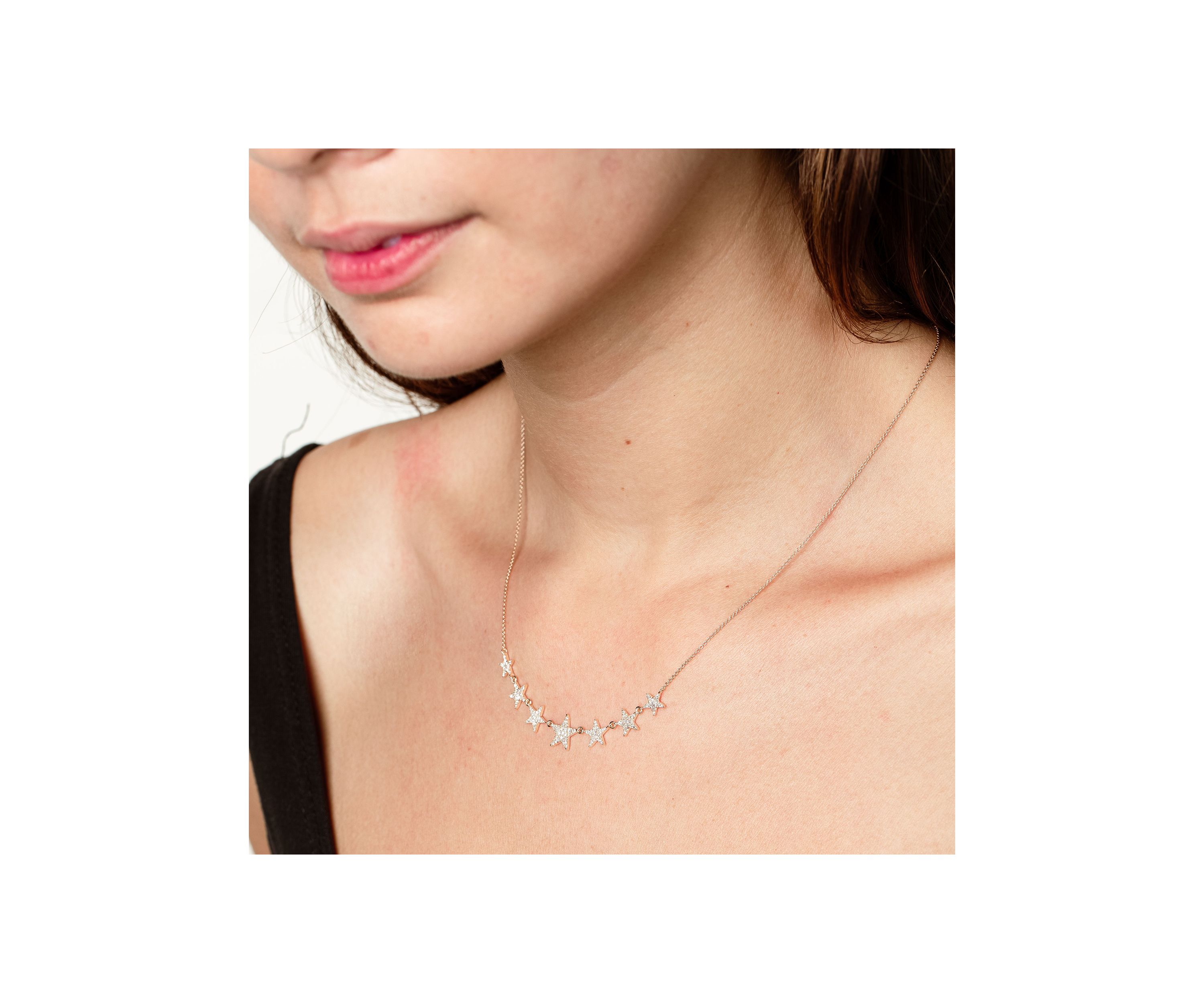 3/8 ct. t.w. Diamond Graduated Star Necklace in 14K Yellow Gold