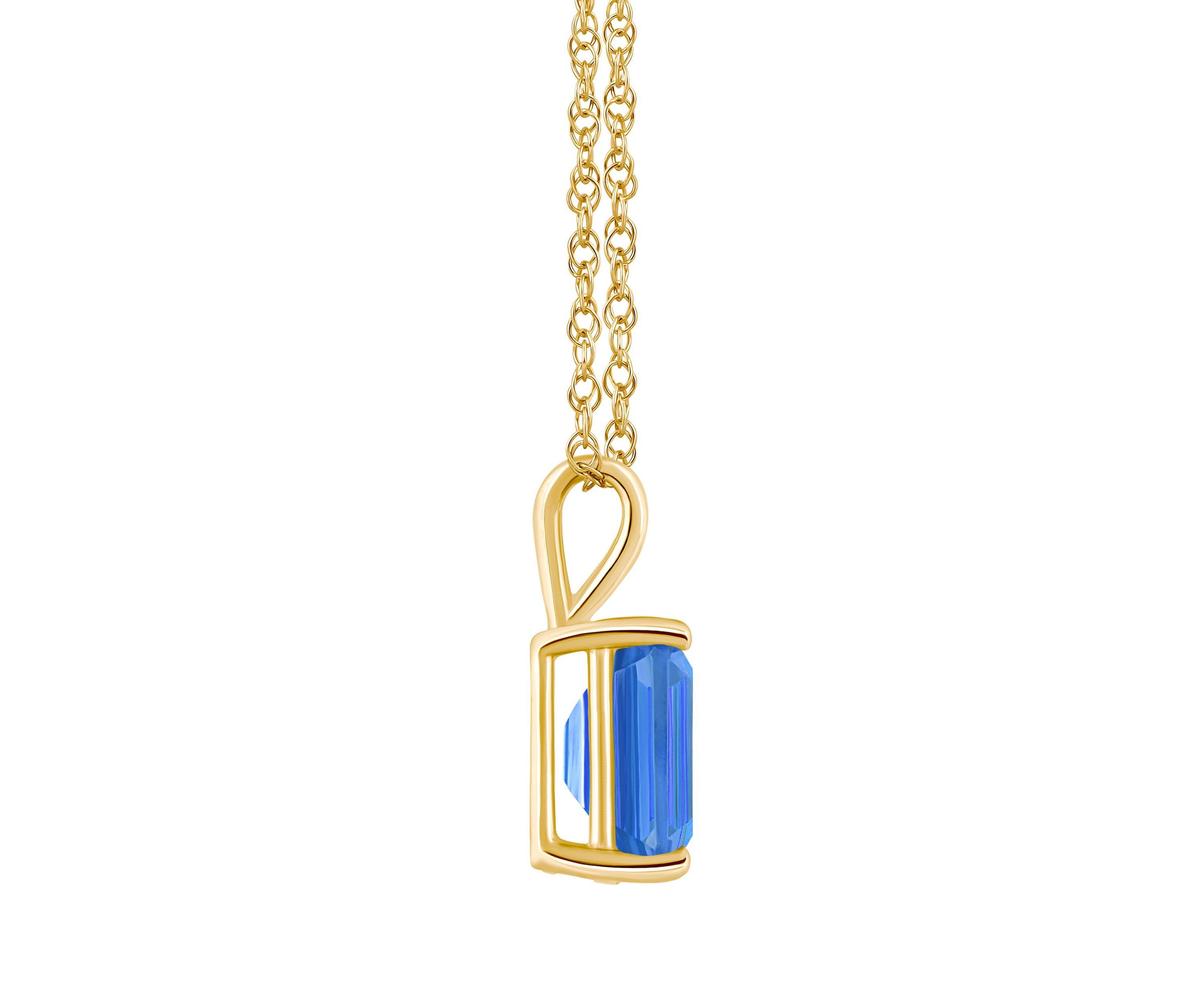 14K Gold 10x8 Emerald Cut Blue Topaz Pendant