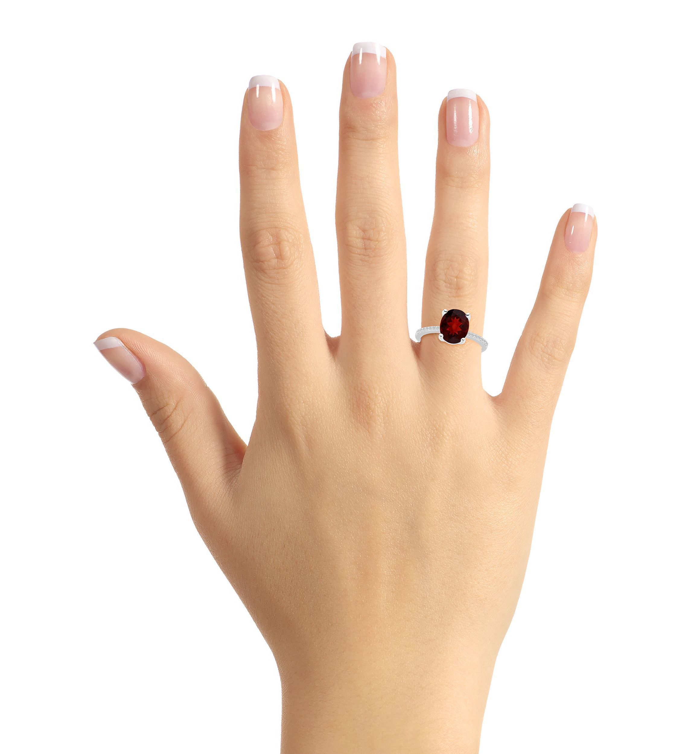 Sterling Silver 10x8mm Oval Garnet 1/10 CTTW Diamond Ring