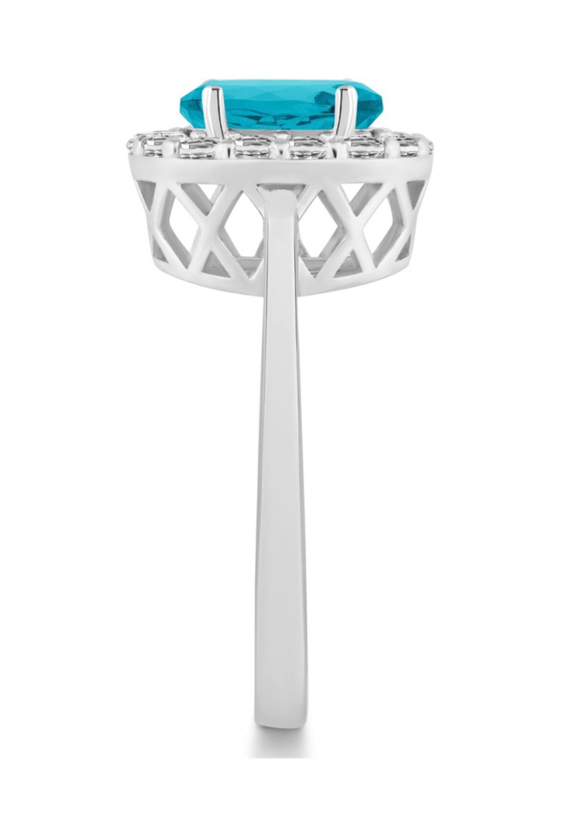 Sterling Silver 8x6mm Oval Blue Topaz And White Topaz Halo Ring