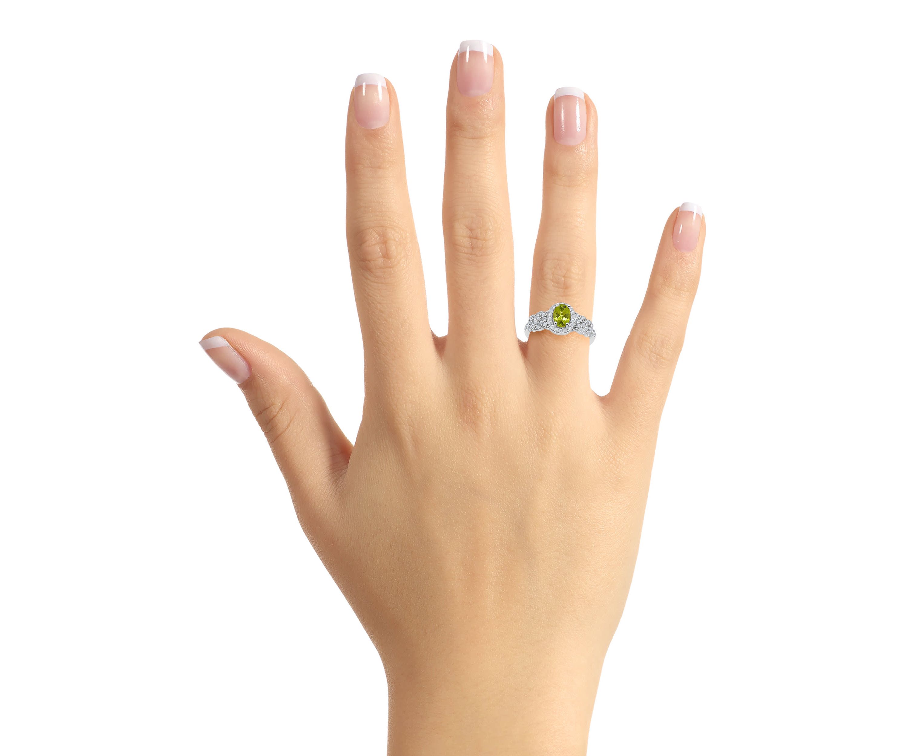 Sterling Silver 7x5mm Oval Peridot and White Topaz Accent Ring
