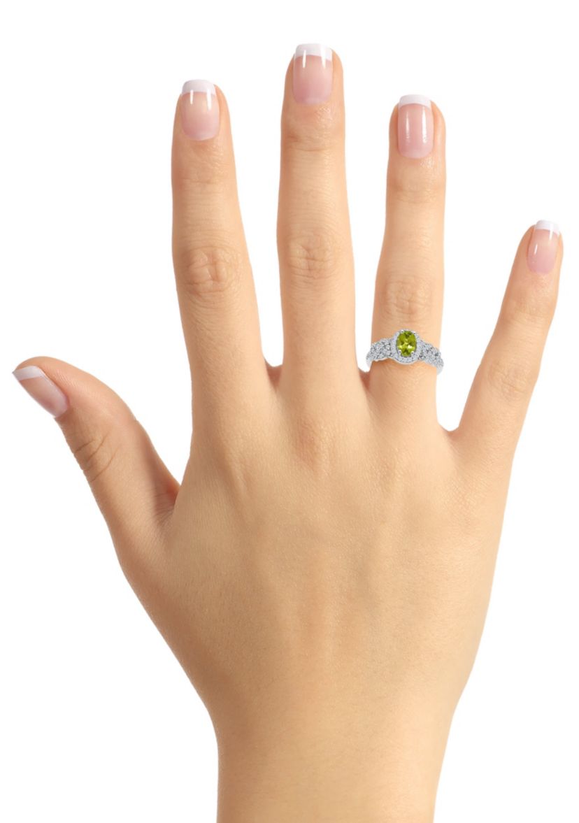 Sterling Silver 7x5mm Oval Peridot and White Topaz Accent Ring