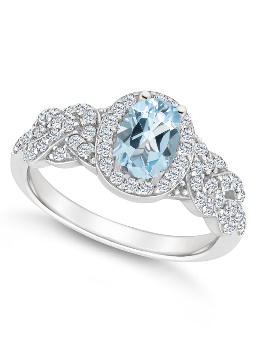 Sterling Silver 7x5mm Oval Sky Blue Topaz and White Topaz Accent Ring