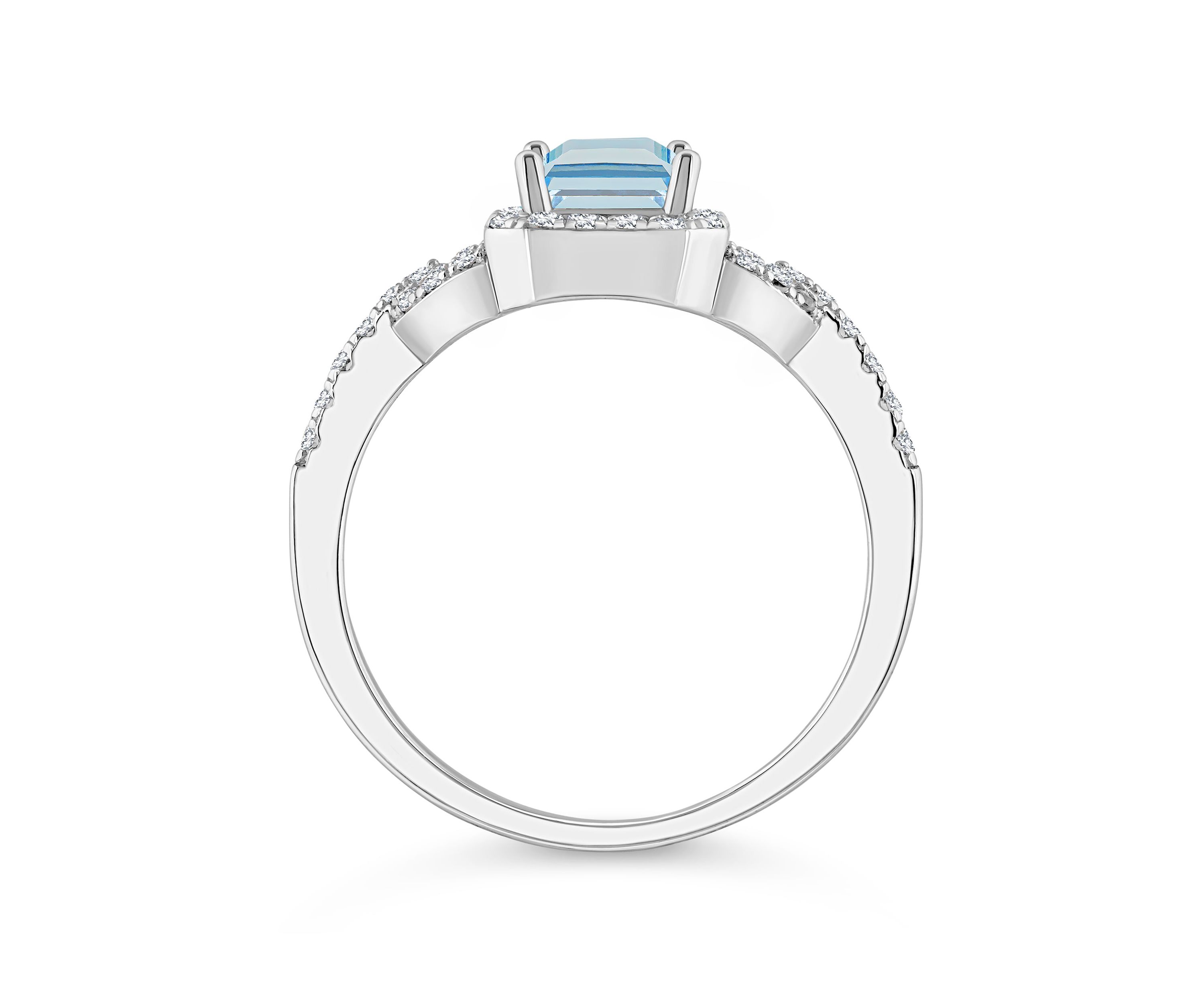 Sterling Silver 7x5mm Emerald Cut Sky Blue Topaz and White Topaz Accent Ring
