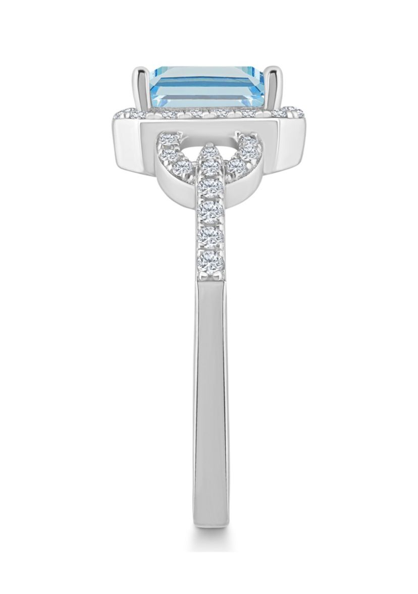 Sterling Silver 7x5mm Emerald Cut Sky Blue Topaz and White Topaz Accent Ring