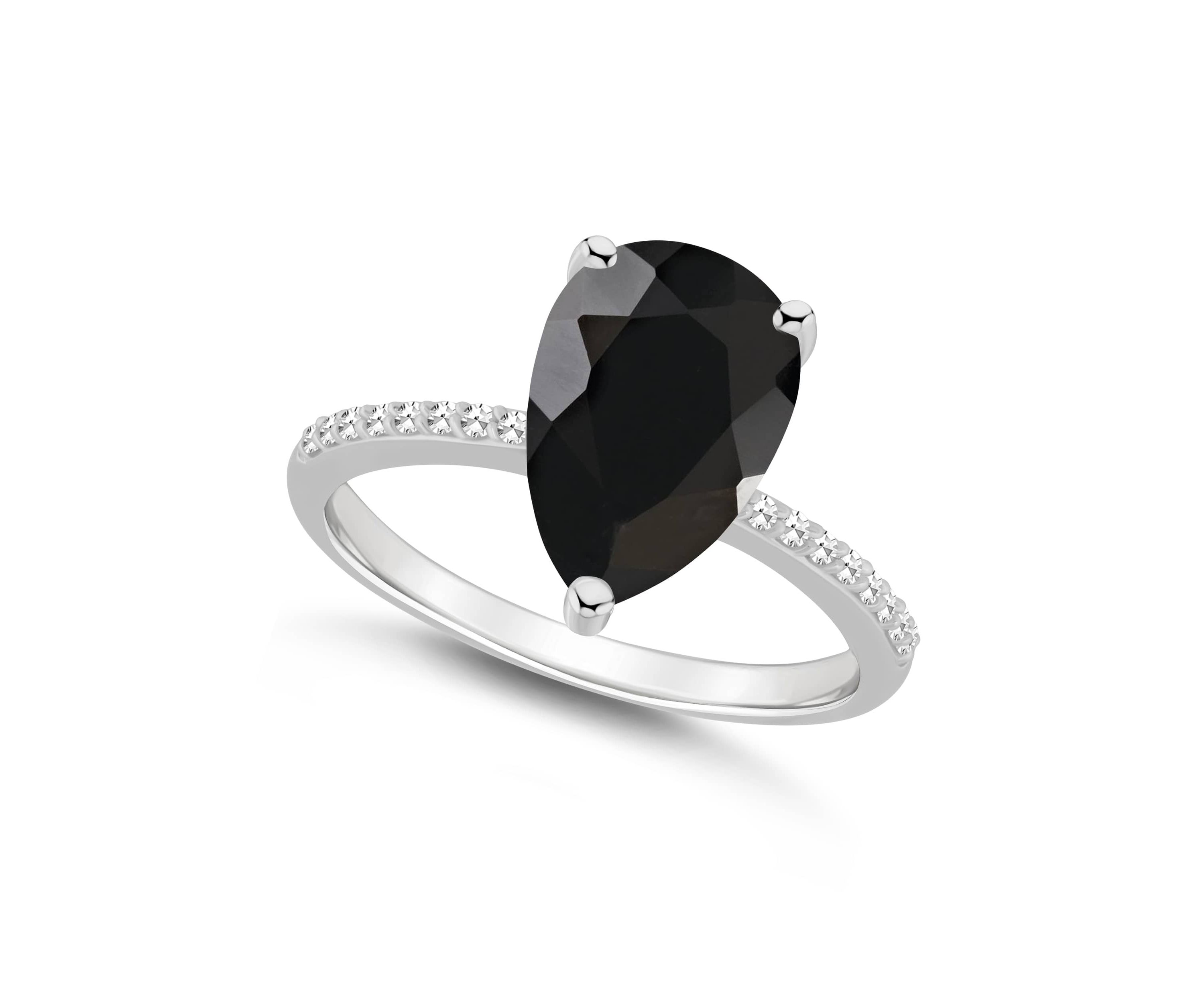 Sterling Silver 12x8mm Pear Shape Black Onyx 1/10 CTTW Diamond Ring