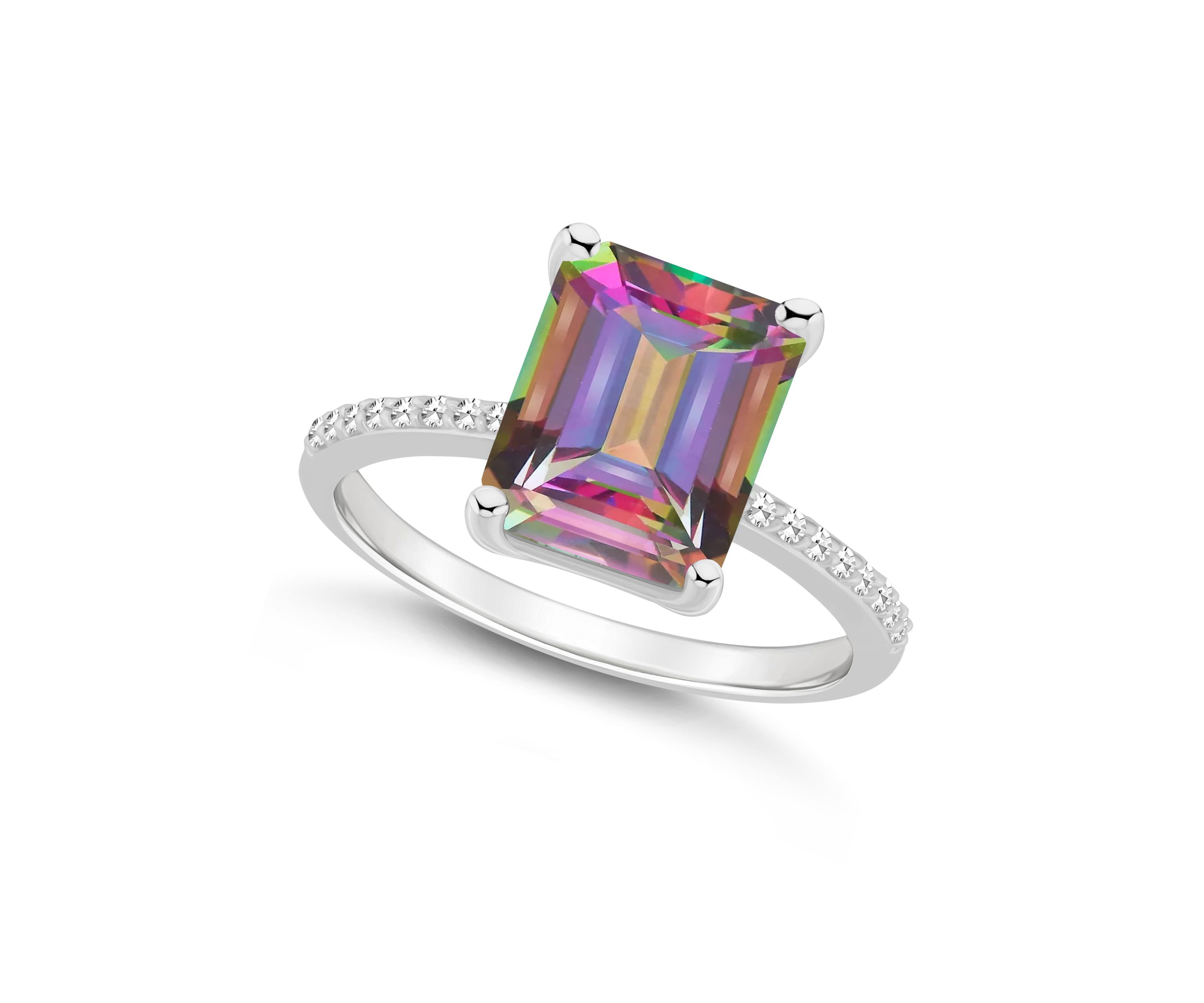 Sterling Silver 10x8mm Emerald Cut Mystic Topaz 1/10 CTTW Diamond Ring