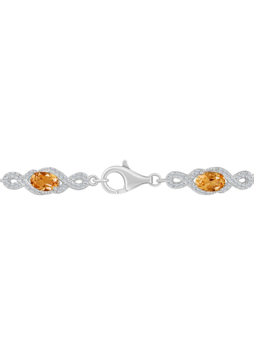 Sterling Silver 6x4mm Oval Citrine and White Topaz Accent Bracelet