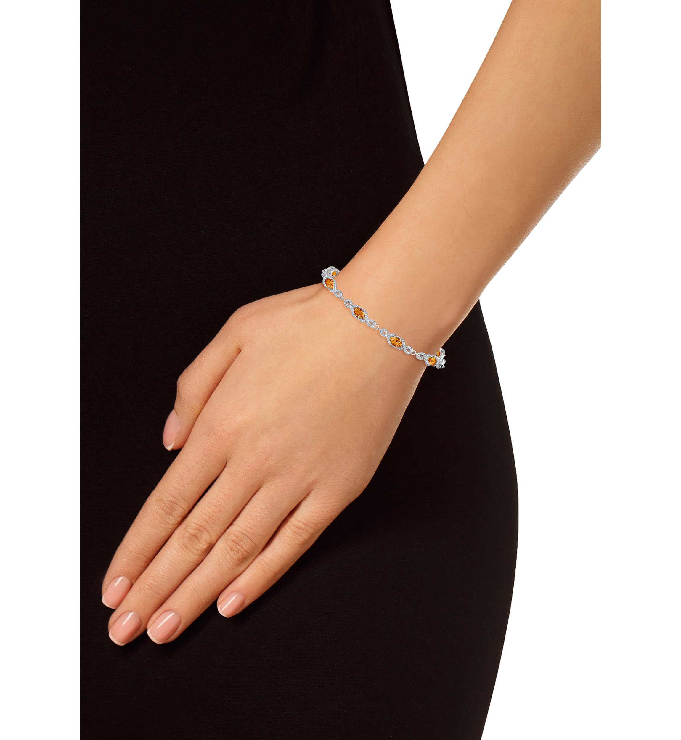 Sterling Silver 6x4mm Oval Citrine and White Topaz Accent Bracelet