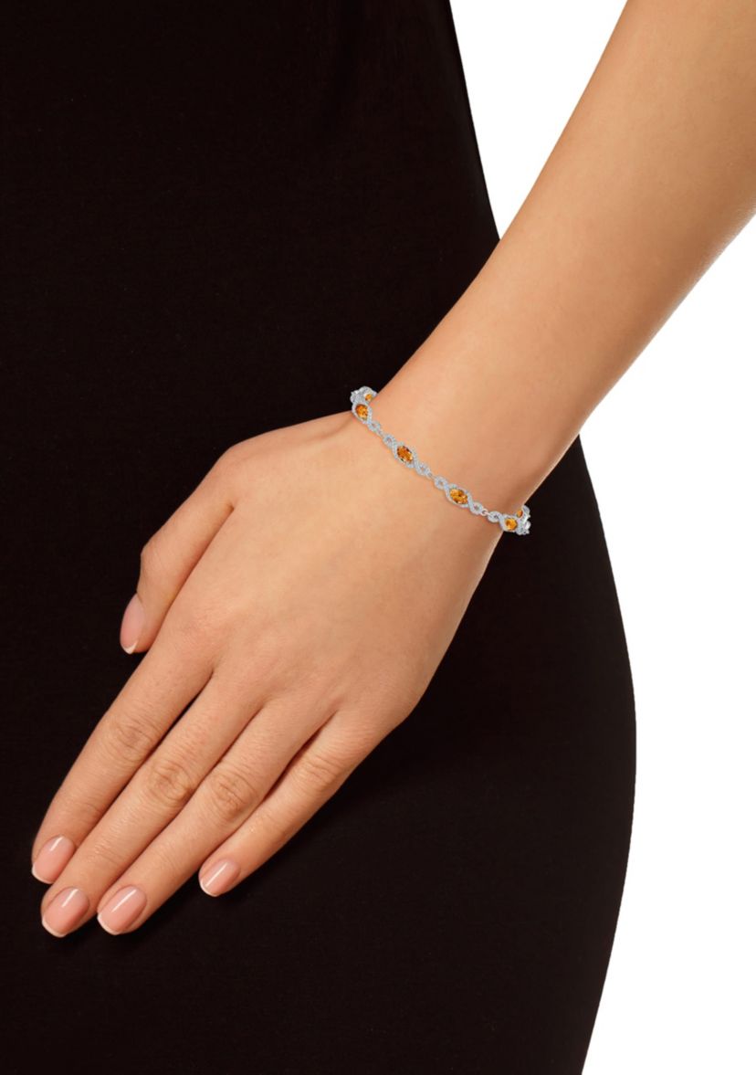 Sterling Silver 6x4mm Oval Citrine and White Topaz Accent Bracelet