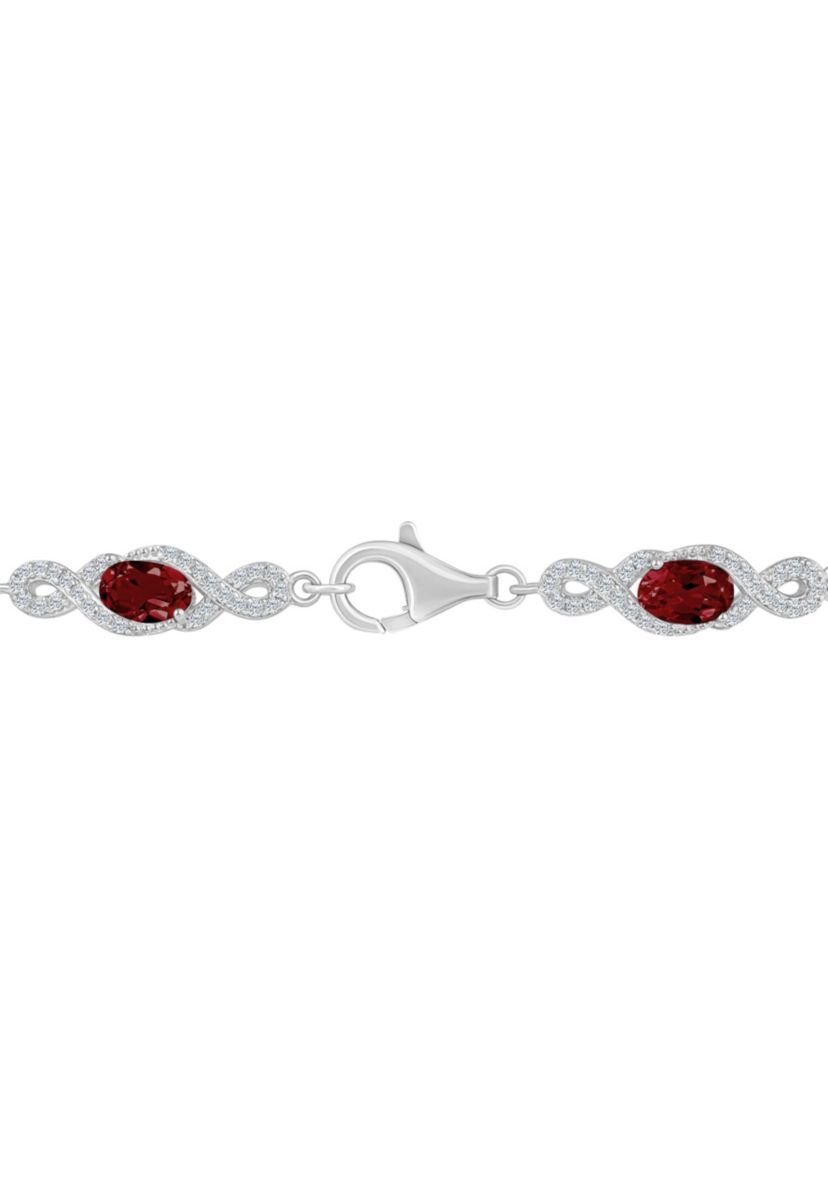 Sterling Silver 6x4mm Oval Garnet and White Topaz Accent Bracelet