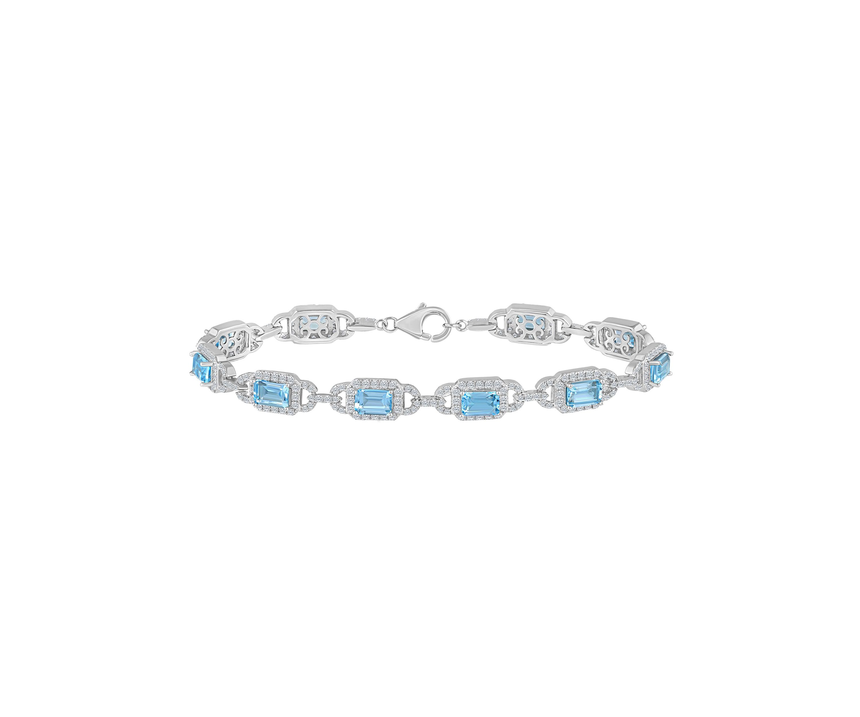 Sterling Silver 6x4mm Emerald Cut Sky Blue Topaz and White Topaz Accent Bracelet