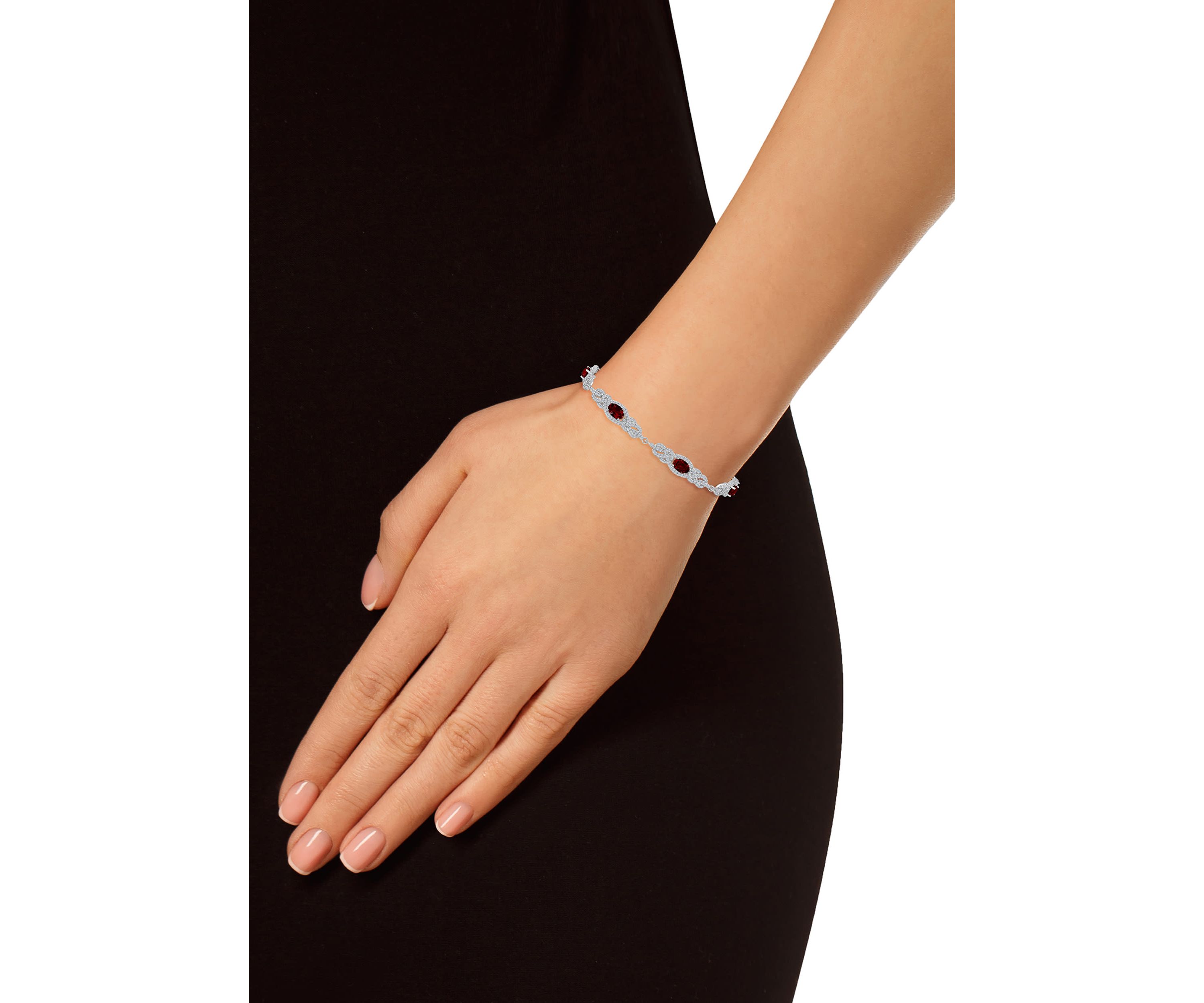 Sterling Silver 6x4mm Oval Garnet and White Topaz Accent Bracelet