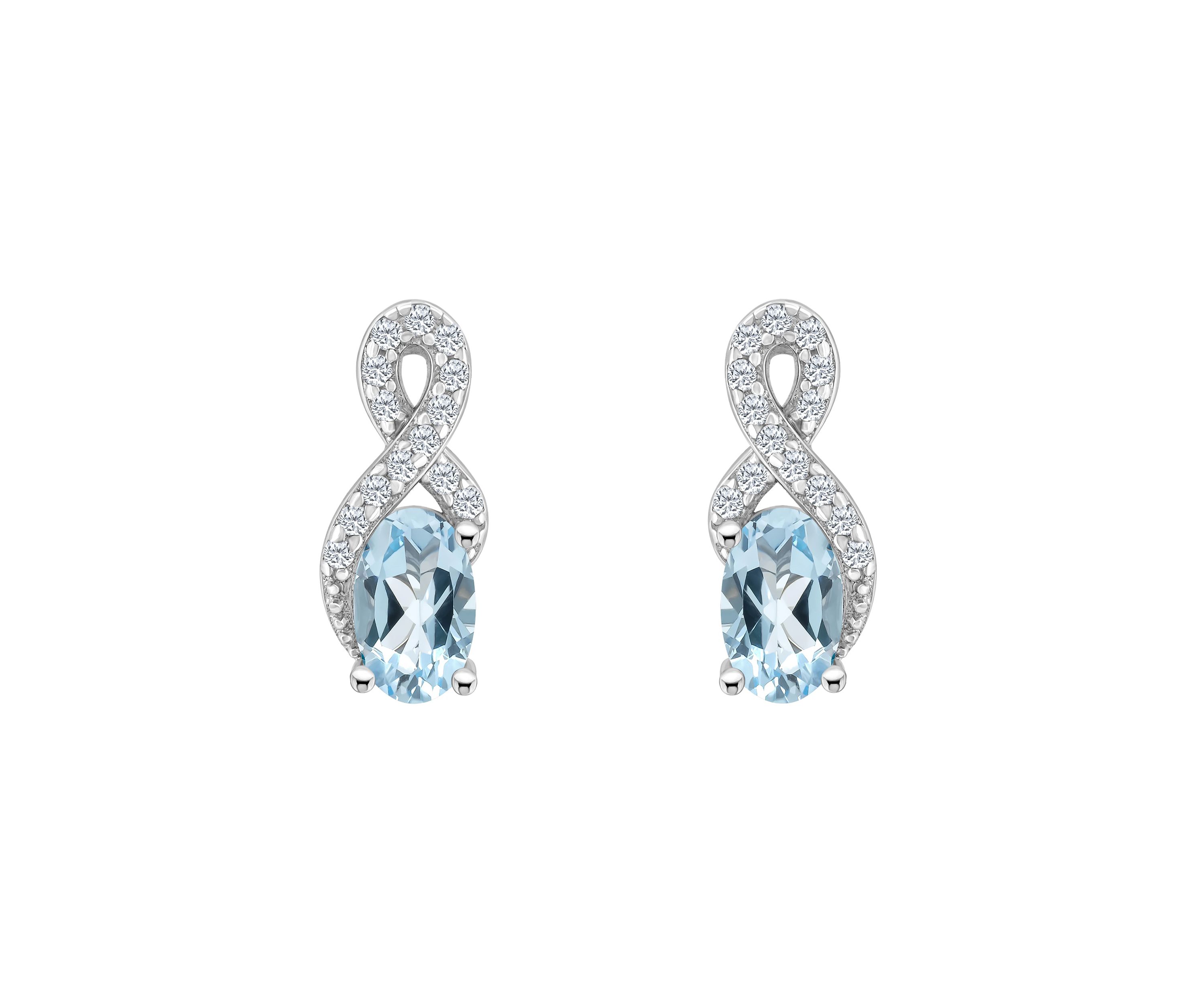 Sterling Silver 6x4mm Oval Sky Blue Topaz and White Topaz Accent Earrings