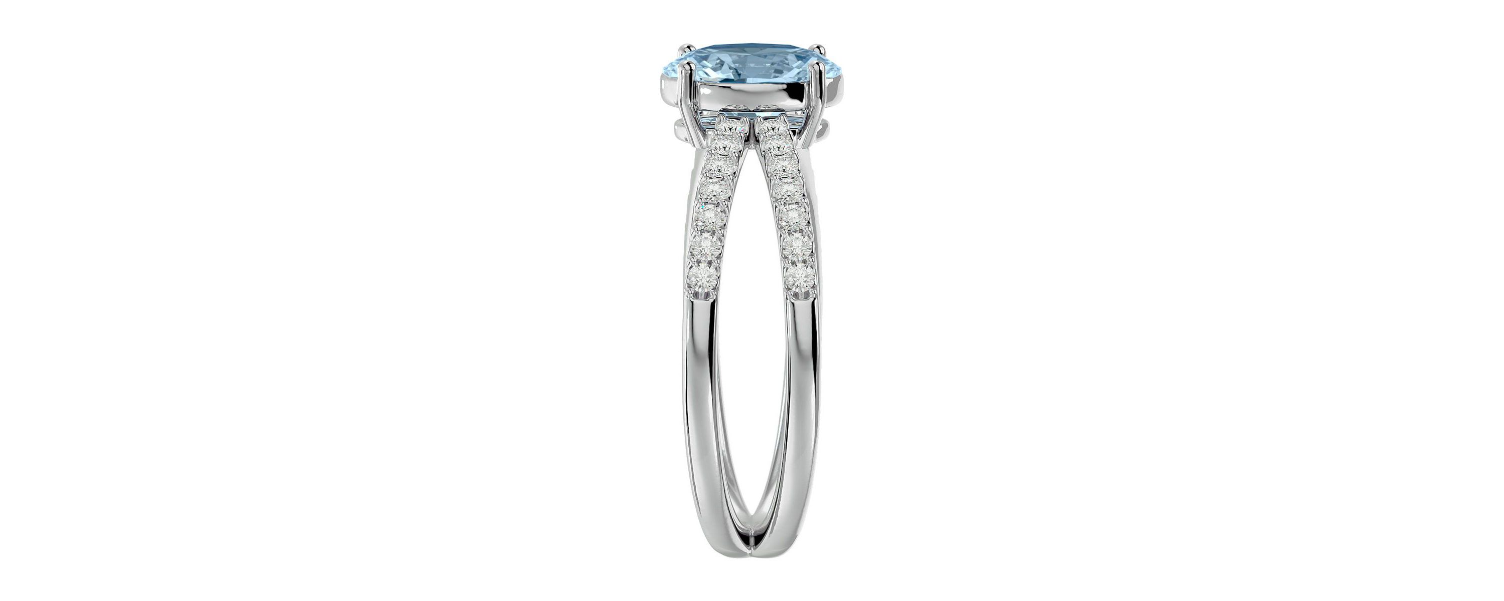 1 1/2 ct. t.w. Oval Shape Aquamarine and Halo Diamond Ring In Sterling Silver