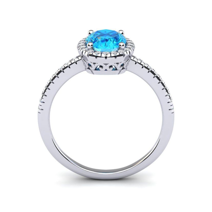 1 1/2cttw Oval Shape Blue Topaz and Halo Diamond Ring In Sterling Silver