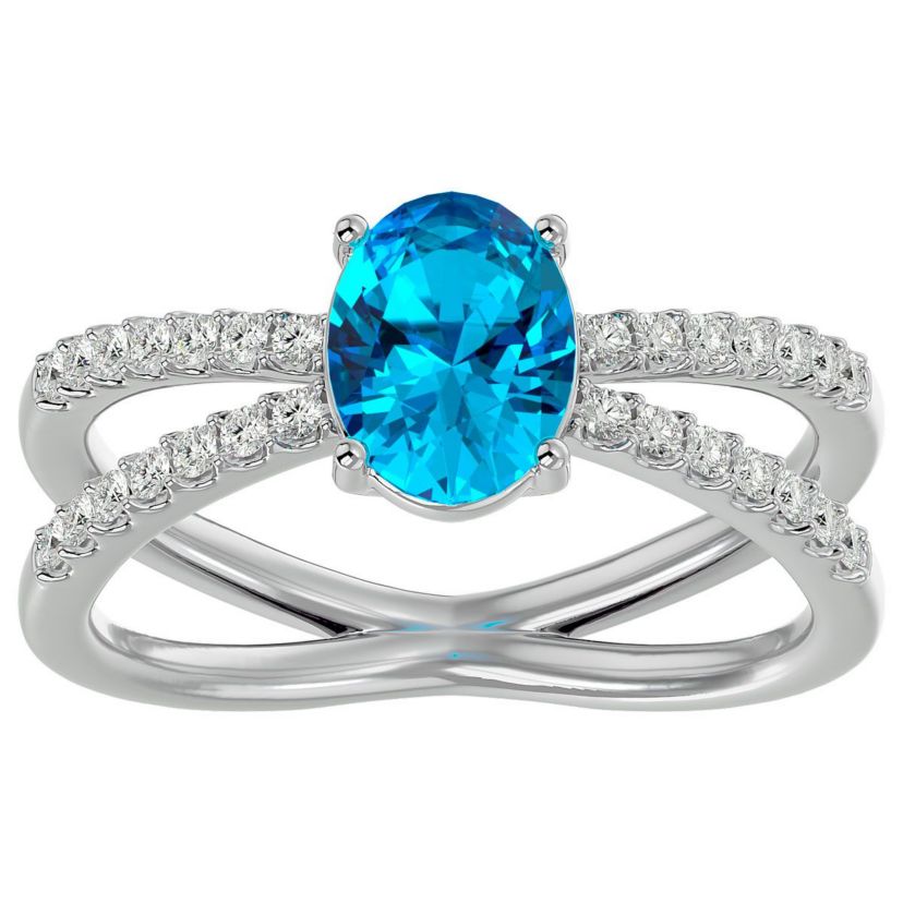1 1/2 ct. t.w. Oval Shape Blue Topaz and Halo Diamond Ring In Sterling Silver