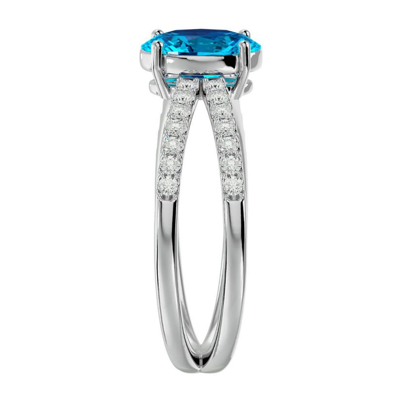 1 1/2 ct. t.w. Oval Shape Blue Topaz and Halo Diamond Ring In Sterling Silver