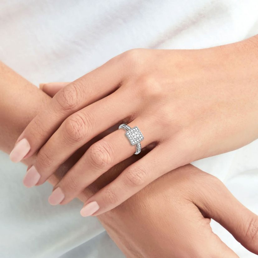 0.33 CTTW Diamond Right hand ring in Rhosium Plated Sterling Silver