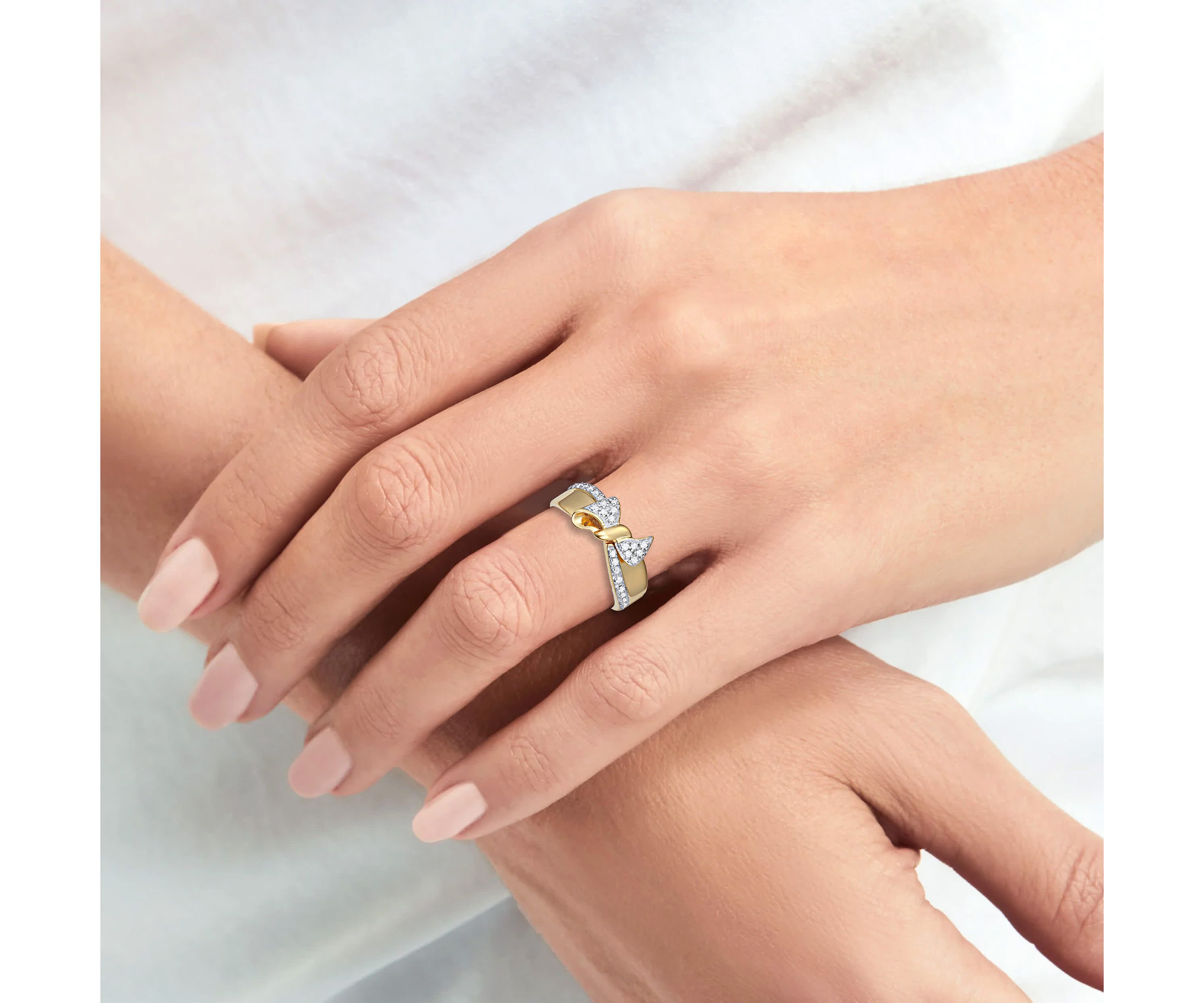 0.16CTTW Diamond Bow Ring in Sterling Silver