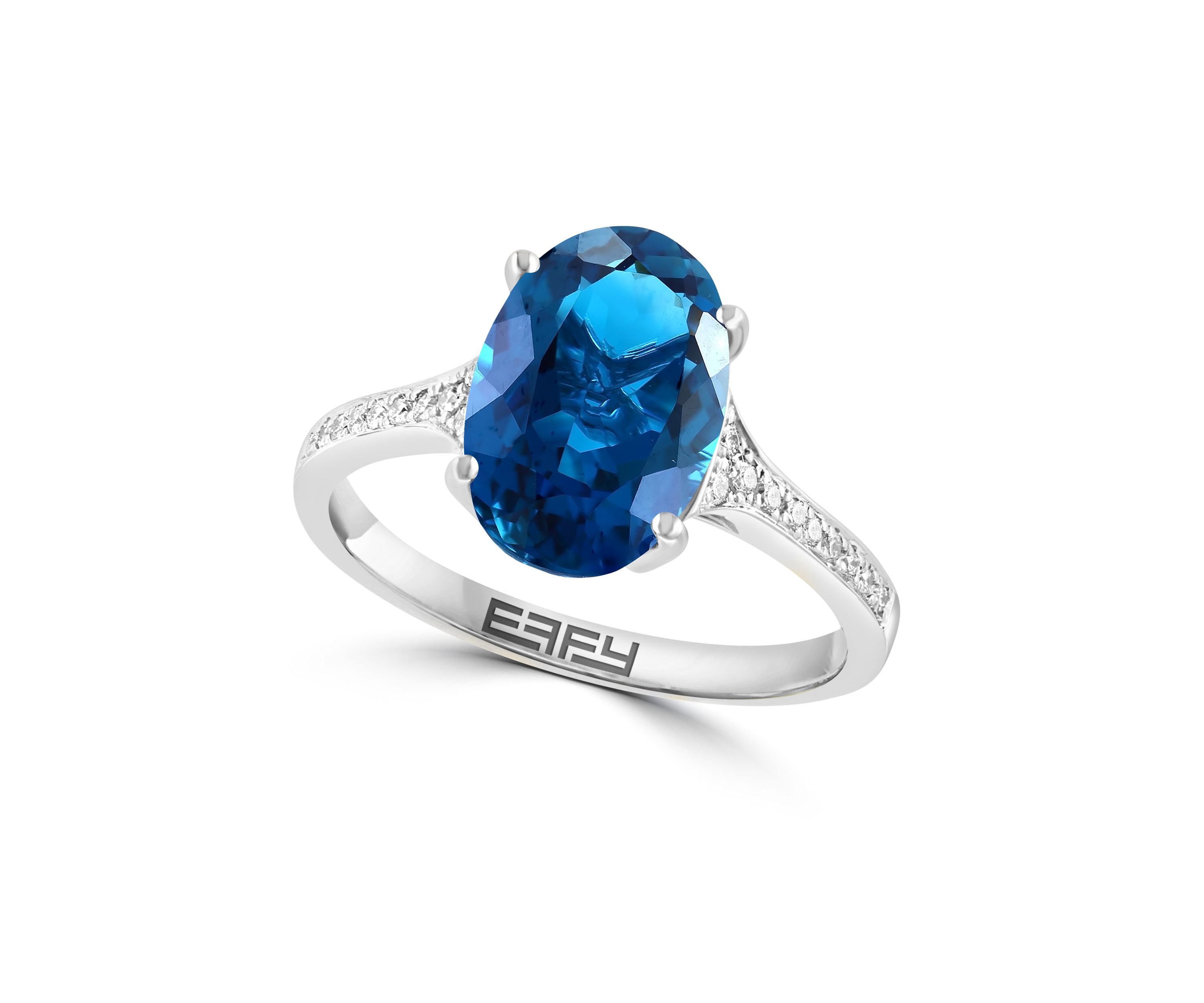 Diamond and Blue Topaz Ring in 14K White Gold