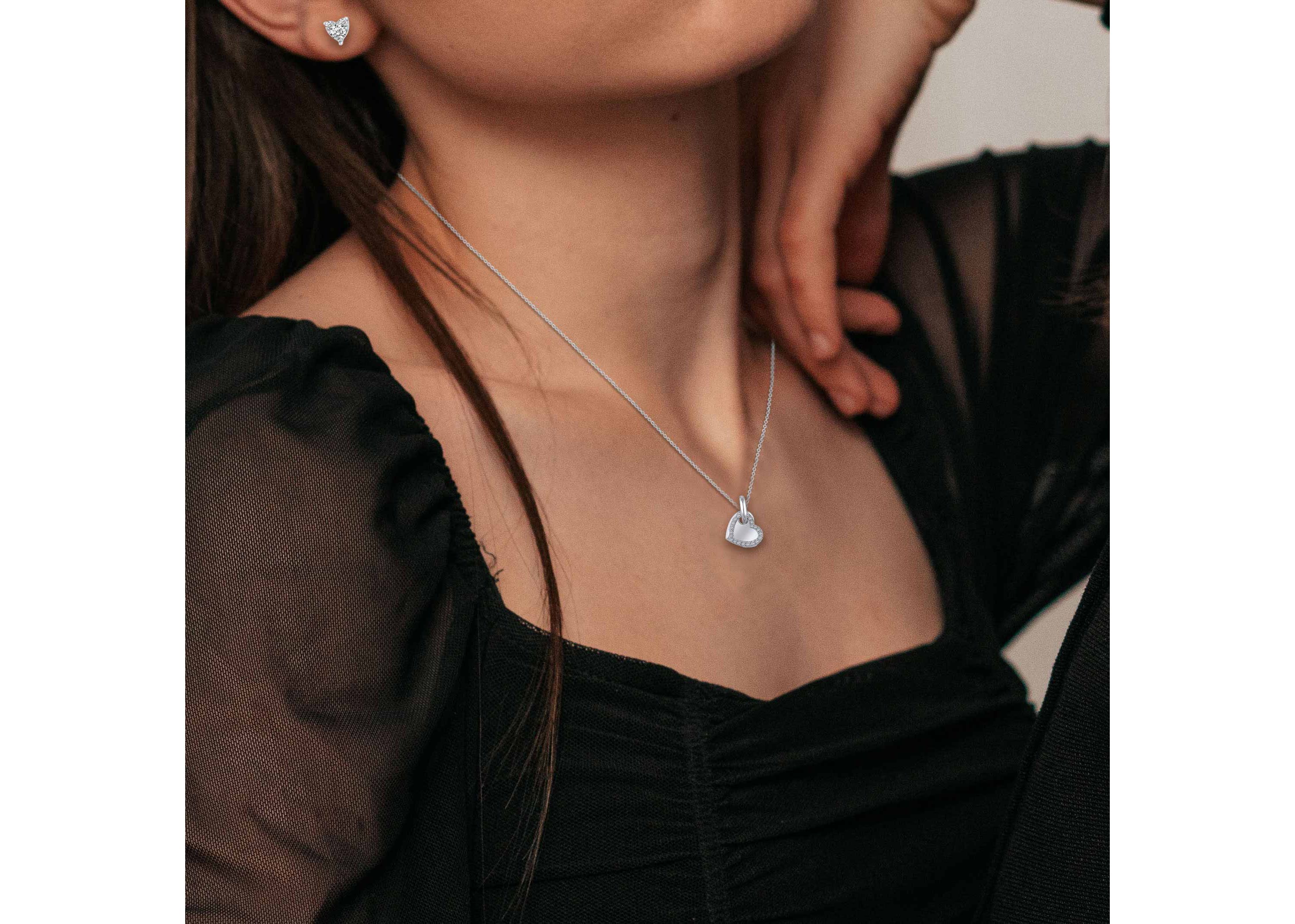 1/10 Ctw Diamond Double Heart Pendant in 10K White Gold with 18" cable chain