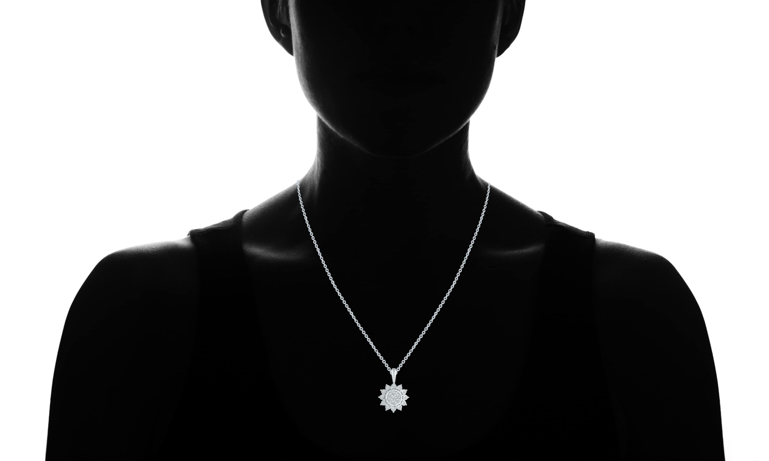 1/6 ct. t.w. Natural Diamond Cluster Pendant set in 925 Sterling Silver with 18" Cable Chain