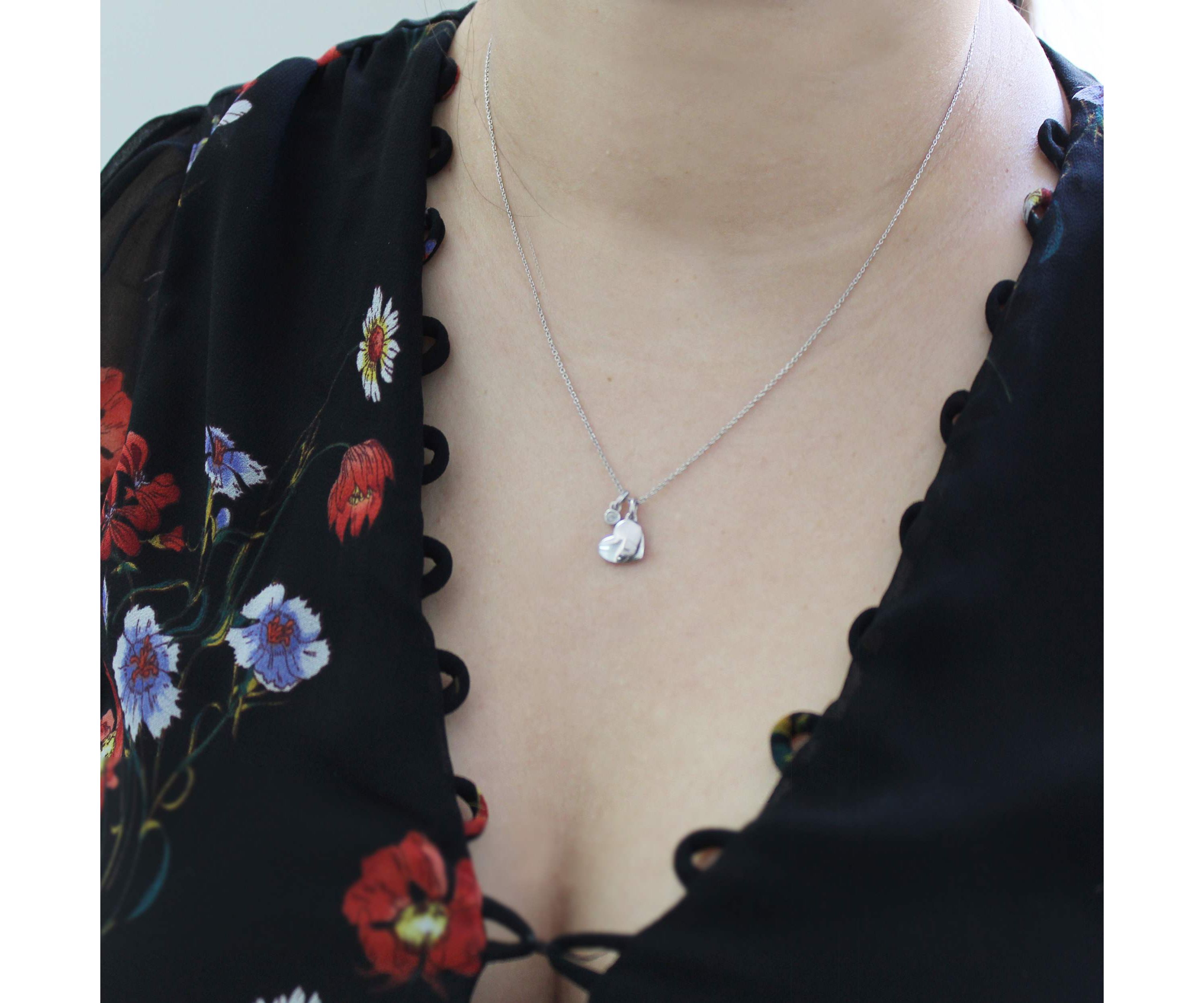 1/20 ct. t.w. Natural Diamond Floating Heart Pendant set in 925 Sterling Silver with 18" Cable Chain