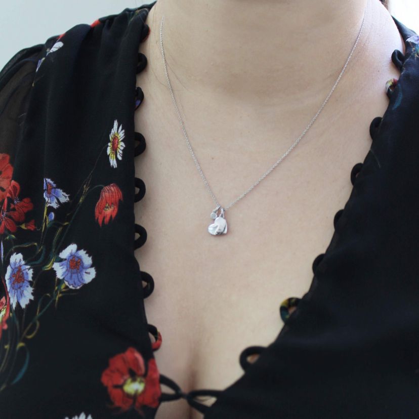 1/20 ct. t.w. Natural Diamond Floating Heart Pendant set in 925 Sterling Silver with 18" Cable Chain