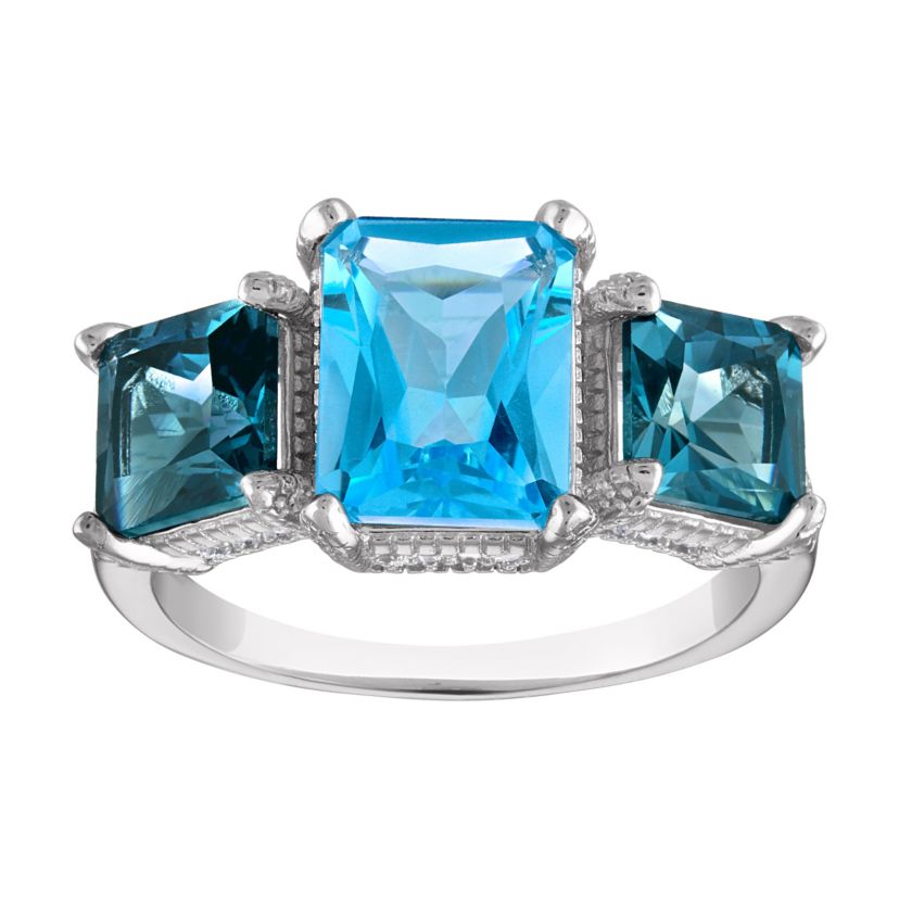 Sterling Silver Blue Topaz And Created White Sapphire Ring