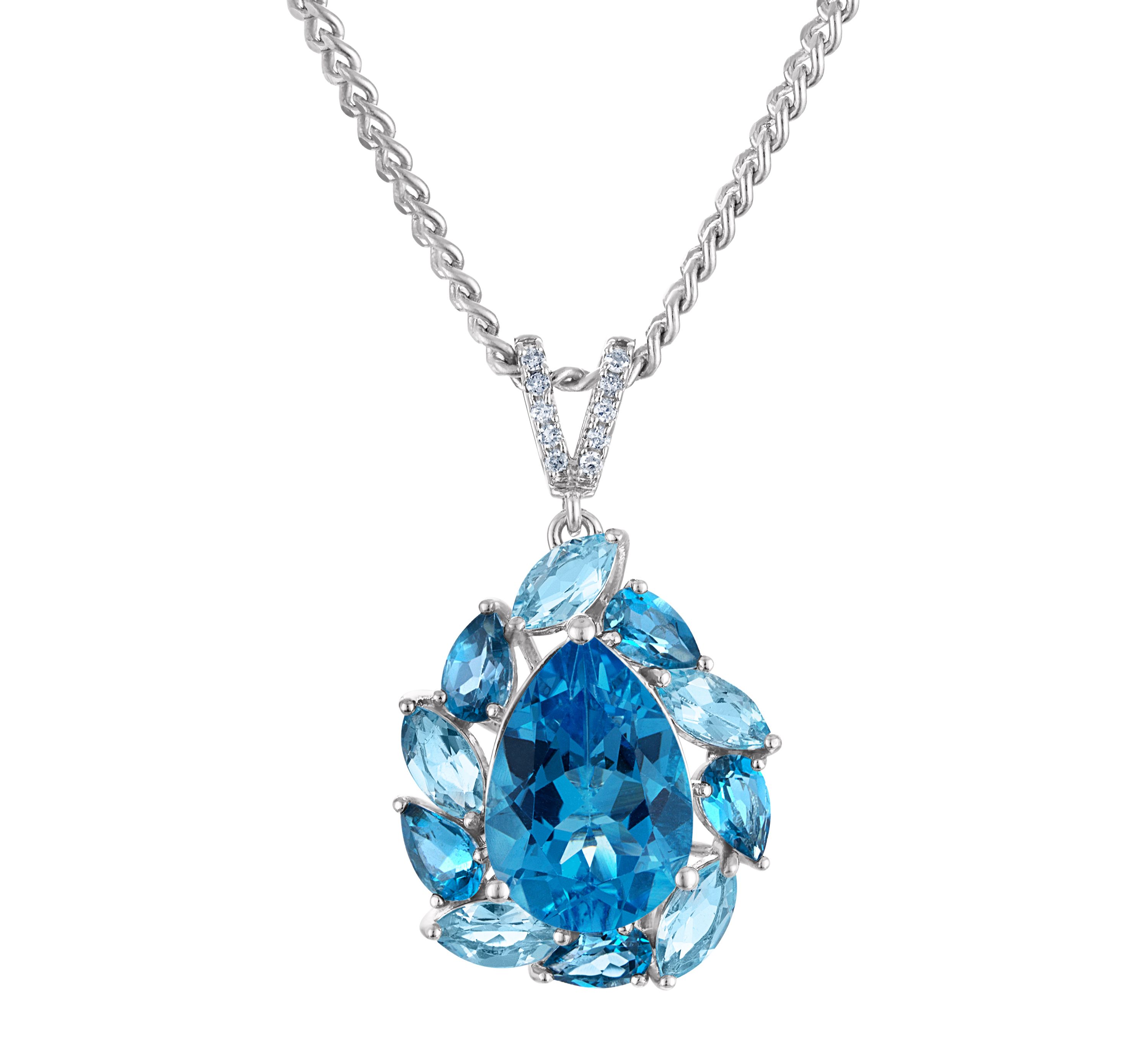 Sterling Silver Blue Topaz And Diamond Pendant