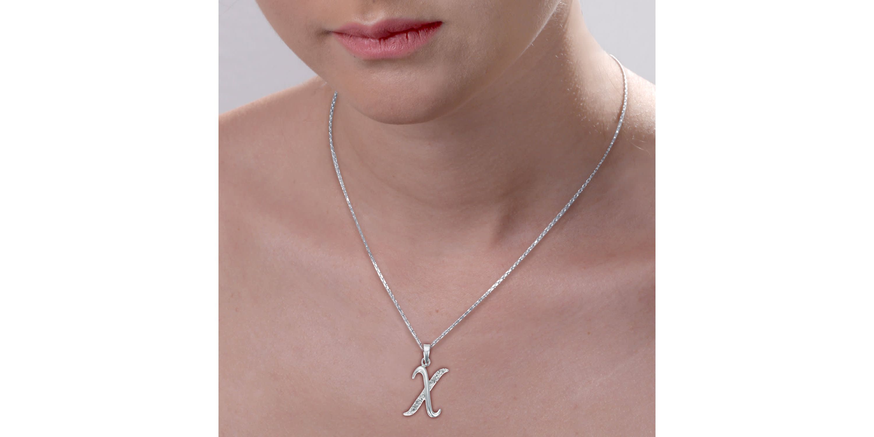 1/8 ct. t.w. Diamond Pendant Necklace Letter X in 925 Sterling Silver