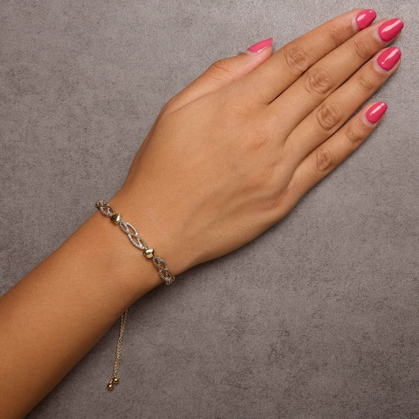 14K Yellow Gold Plated Silver 1/10 Cttw Diamond Wave and Hearts Bolo Bracelet