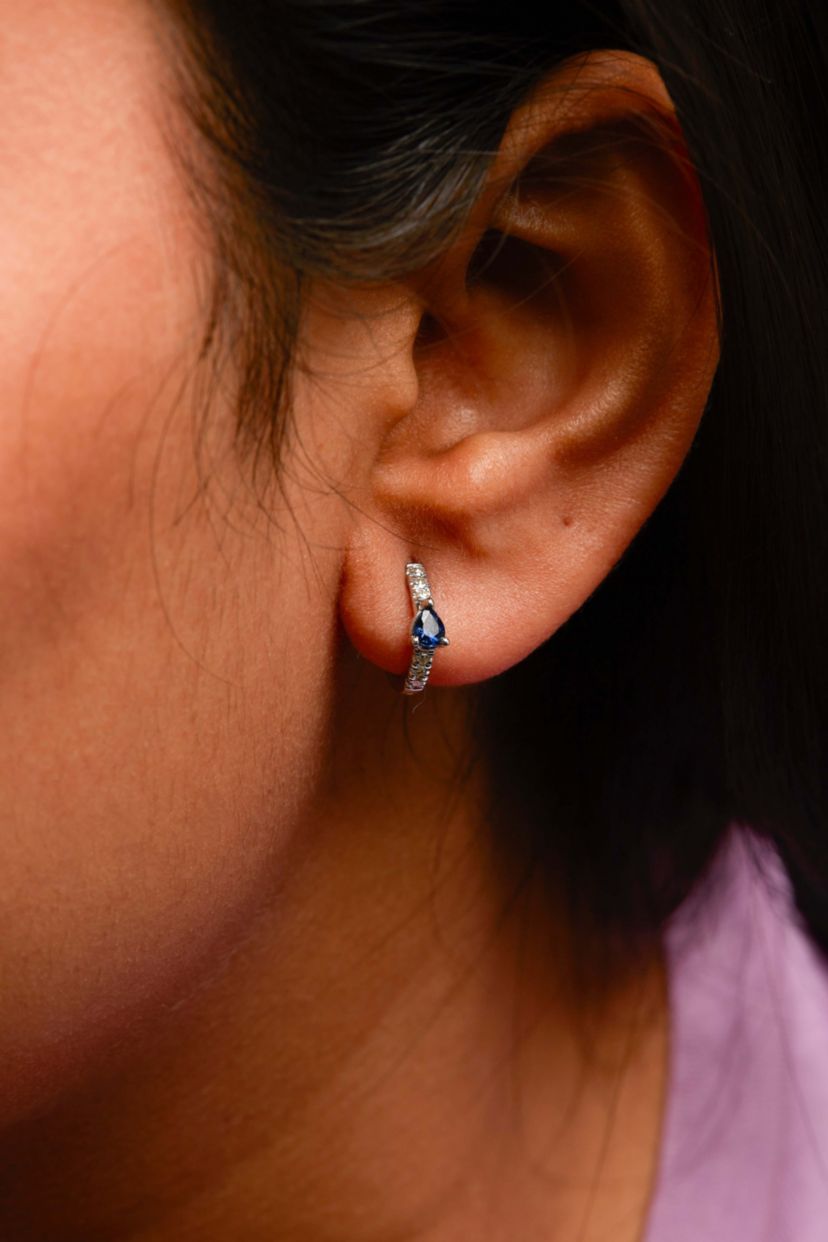 10K White Gold Pear Shaped Blue Sapphire and 1/10 Ct Diamond Huggy Hoop Earrings