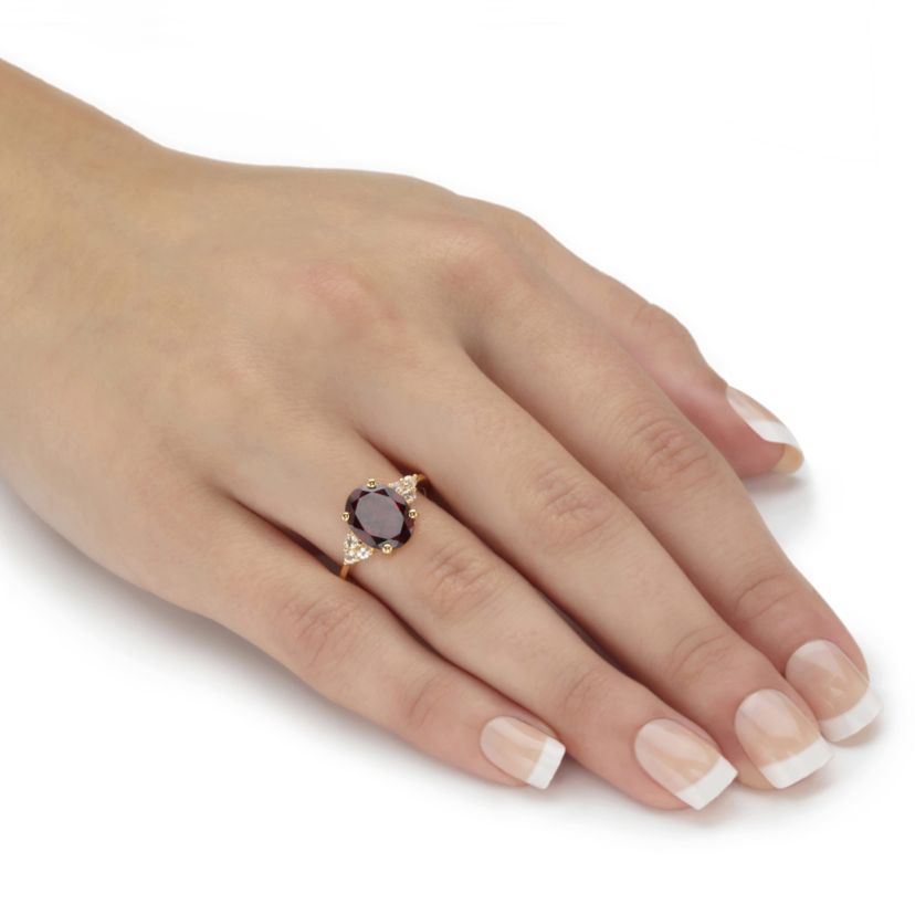 3.99 Cttw. Oval Garnet Ring with White Topaz Accents 14k Gold-Plated Silver Ring