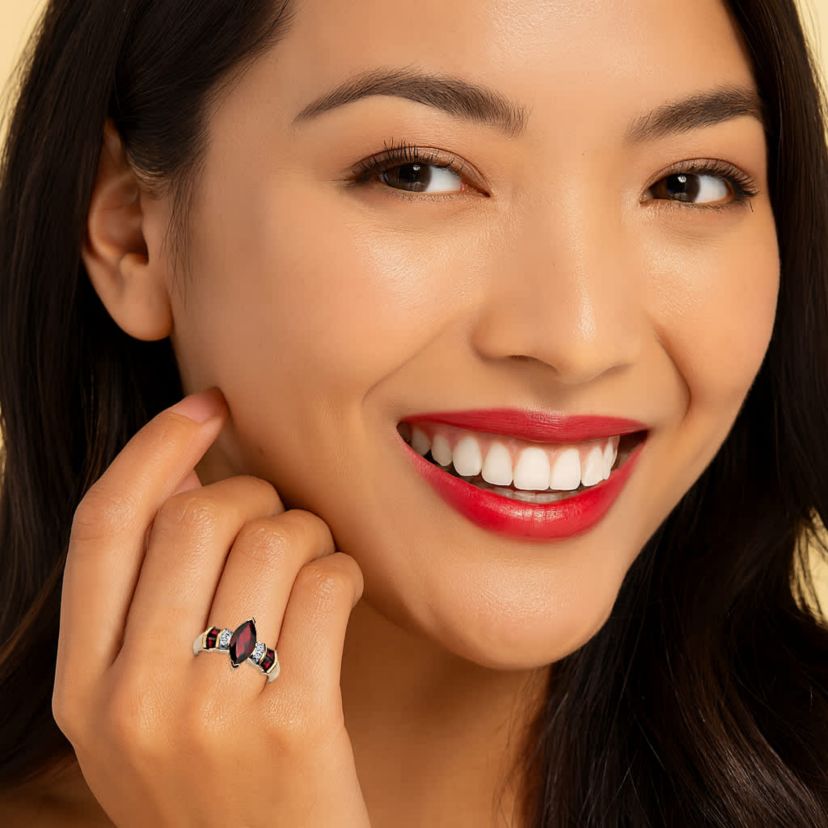 2.85 TCW Marquise-Cut Garnet and Diamond Accent Ring in Solid 10k Gold