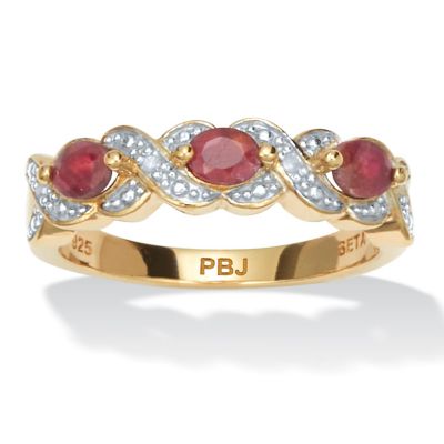 Seta Jewelry .62 TCW Oval Cut Genuine Red Ruby and Diamond Accent 18k Yellow Gold-Plated Sterling Silver Ring