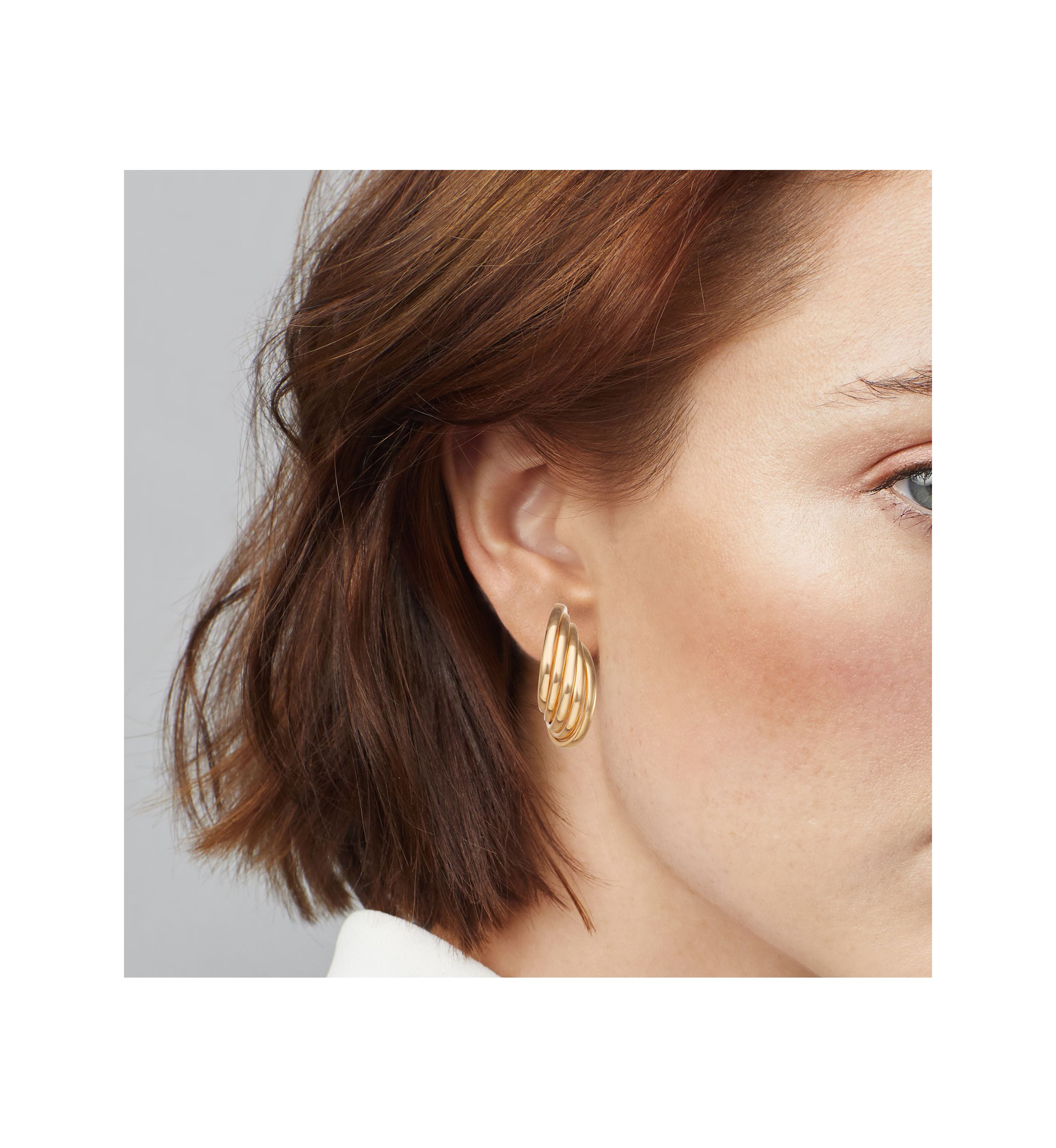 Gold Tone Ribbed C Hoop Earrings