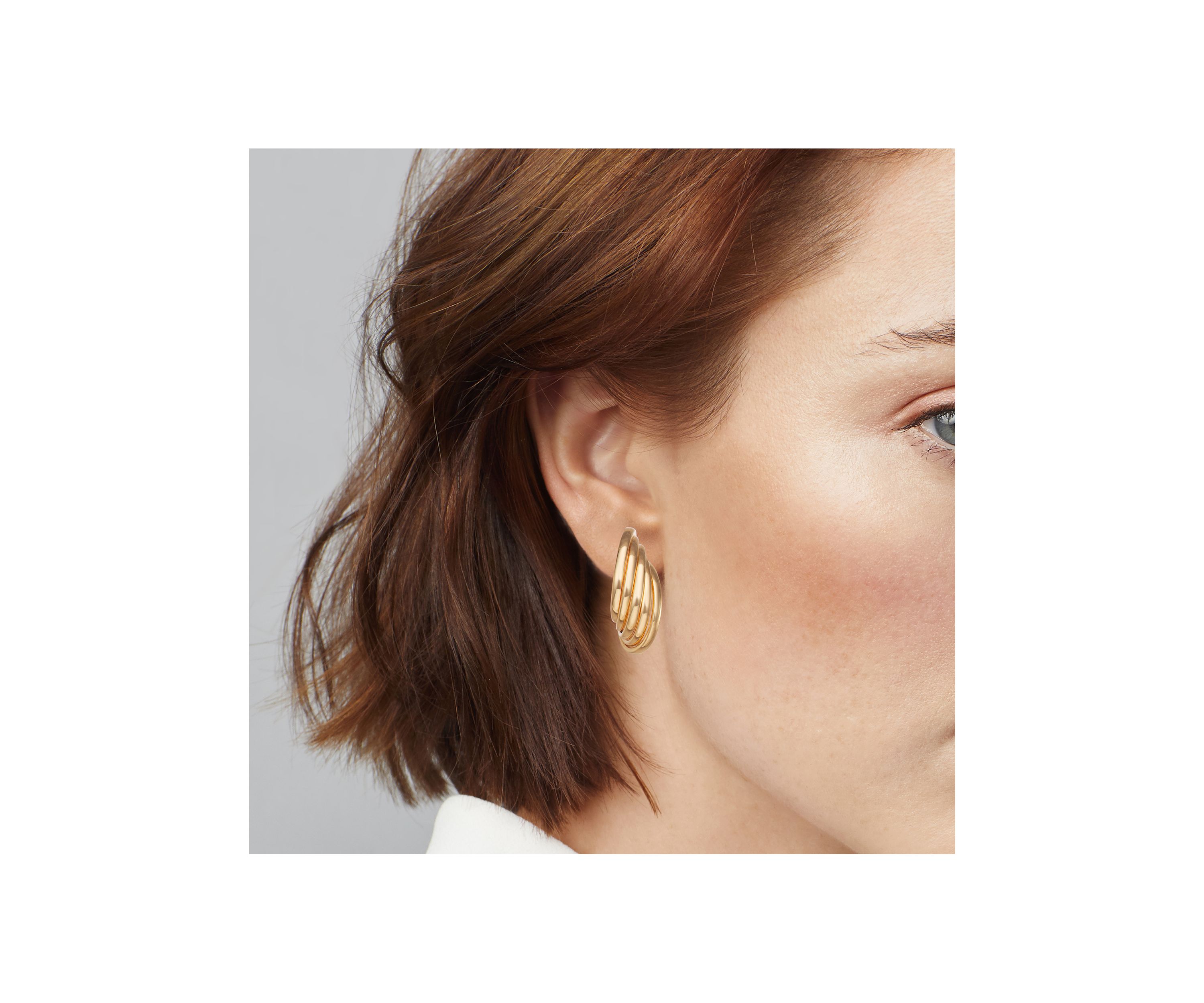 Gold Tone Ribbed C Hoop Earrings