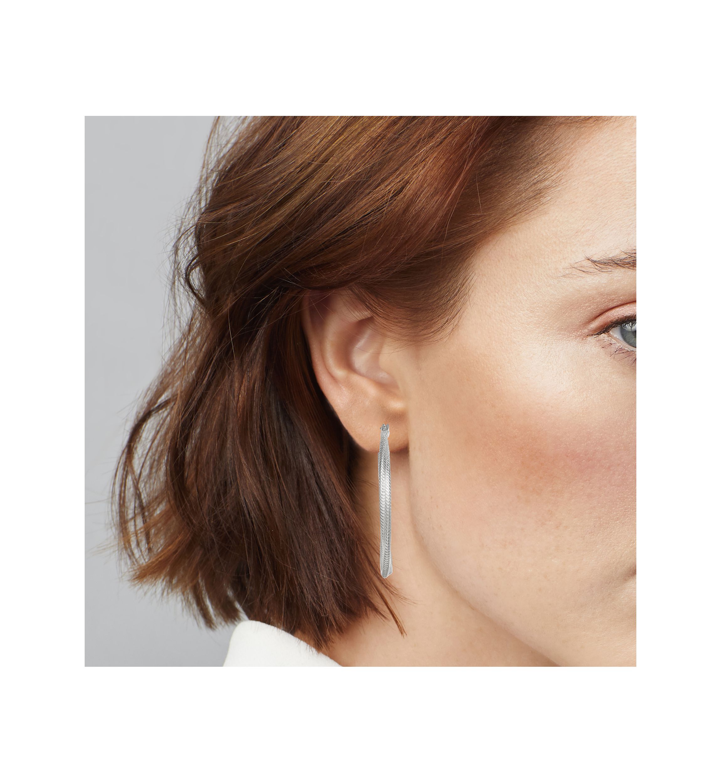 Silver Tone 42 Millimeter Twisted Hoop Post Earrings