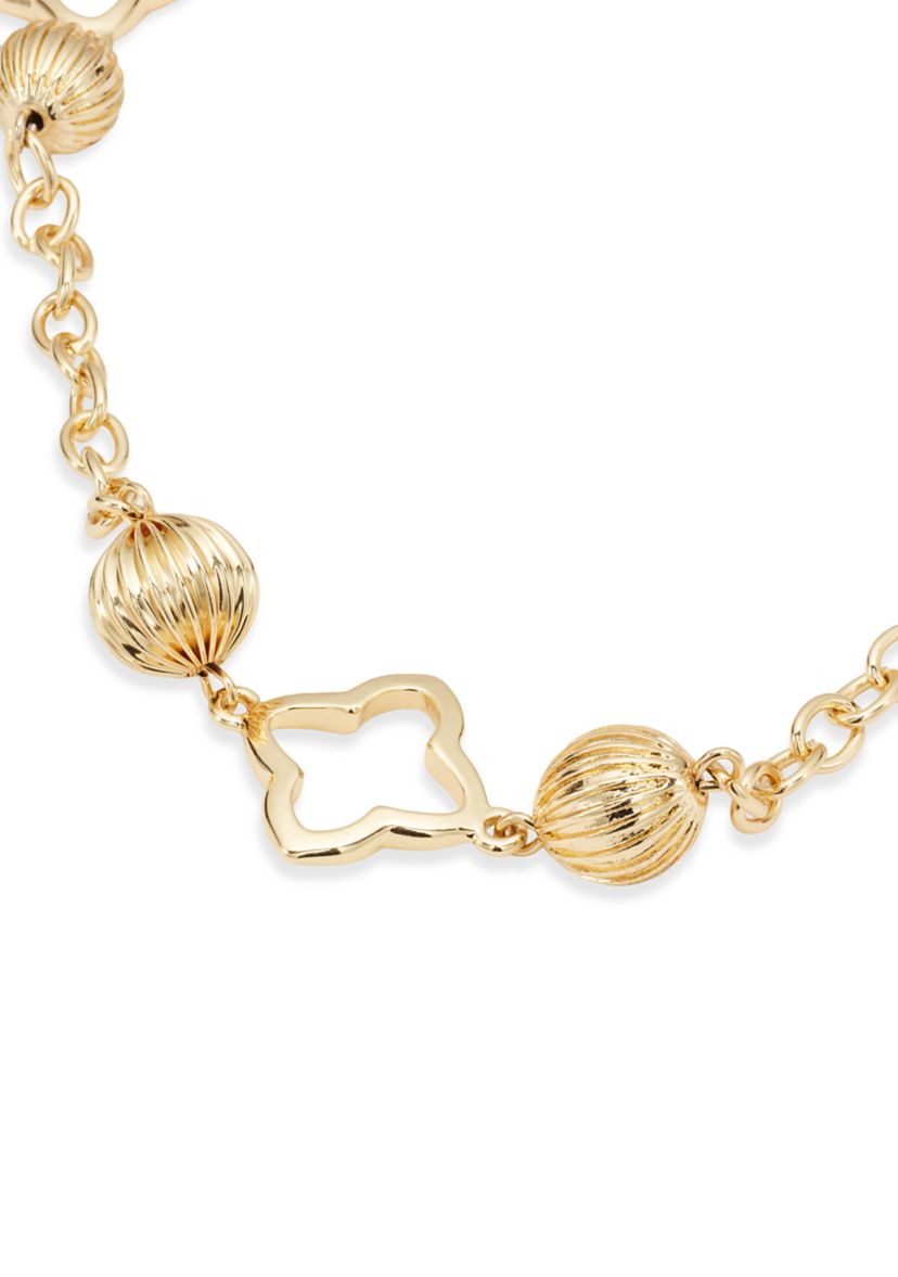 Gold Tone Open Quatrefoil Long Textured Bead Strand Necklace