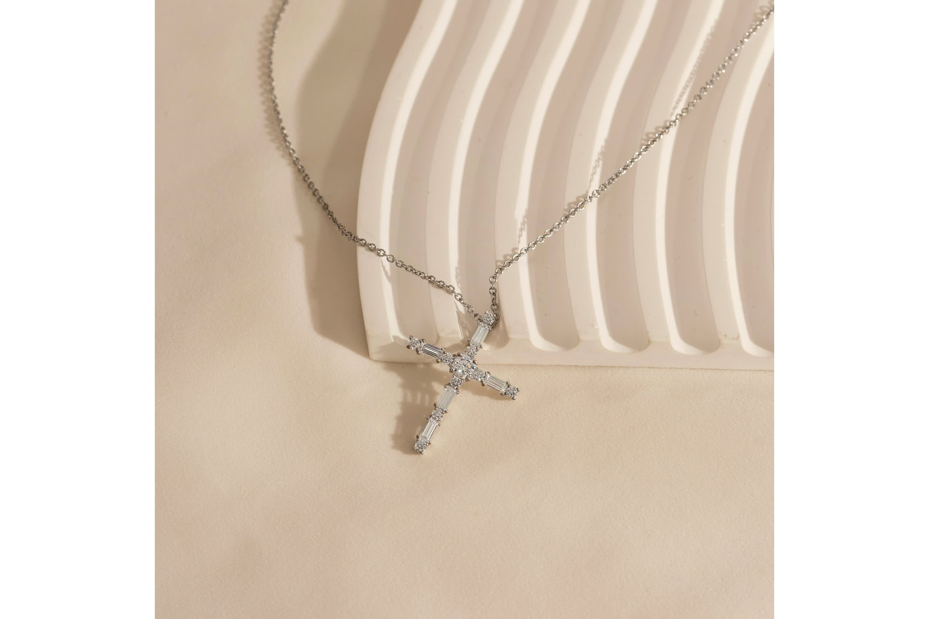 Lab Created Platinum Plated Sterling Silver Mixed Round & Baguette Cut Cubic Zirconia Cross Pendant Necklace