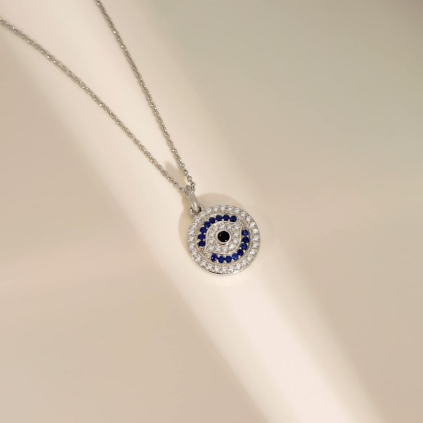 Lab Created Platinum Plated Sterling Silver Synthetic Sapphire and Clear Cubic Zirconia Round Evil Eye Pendant Necklace