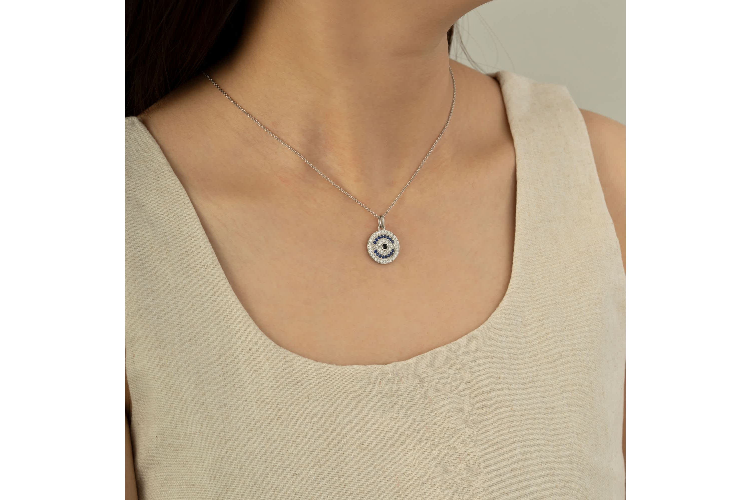 Lab Created Platinum Plated Sterling Silver Synthetic Sapphire and Clear Cubic Zirconia Round Evil Eye Pendant Necklace