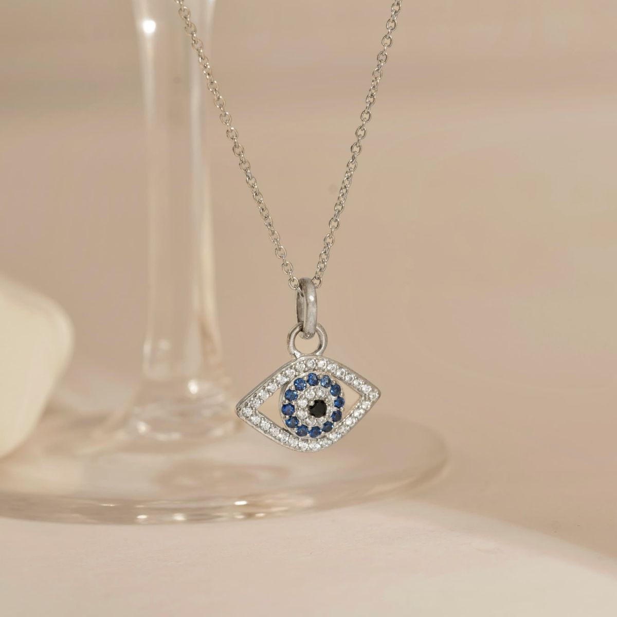 Lab Created Platinum Plated Sterling Silver Synthetic Sapphire and Clear Cubic Zirconia Evil Eye Pendant Necklace