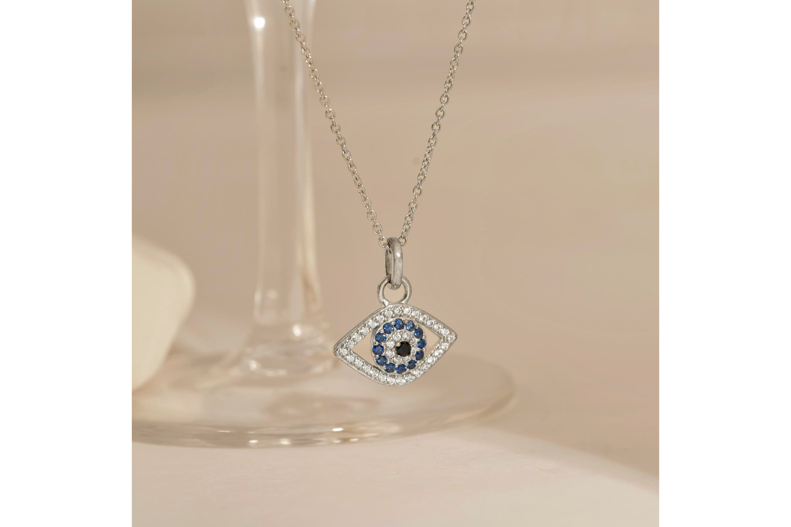 Lab Created Platinum Plated Sterling Silver Synthetic Sapphire and Clear Cubic Zirconia Evil Eye Pendant Necklace
