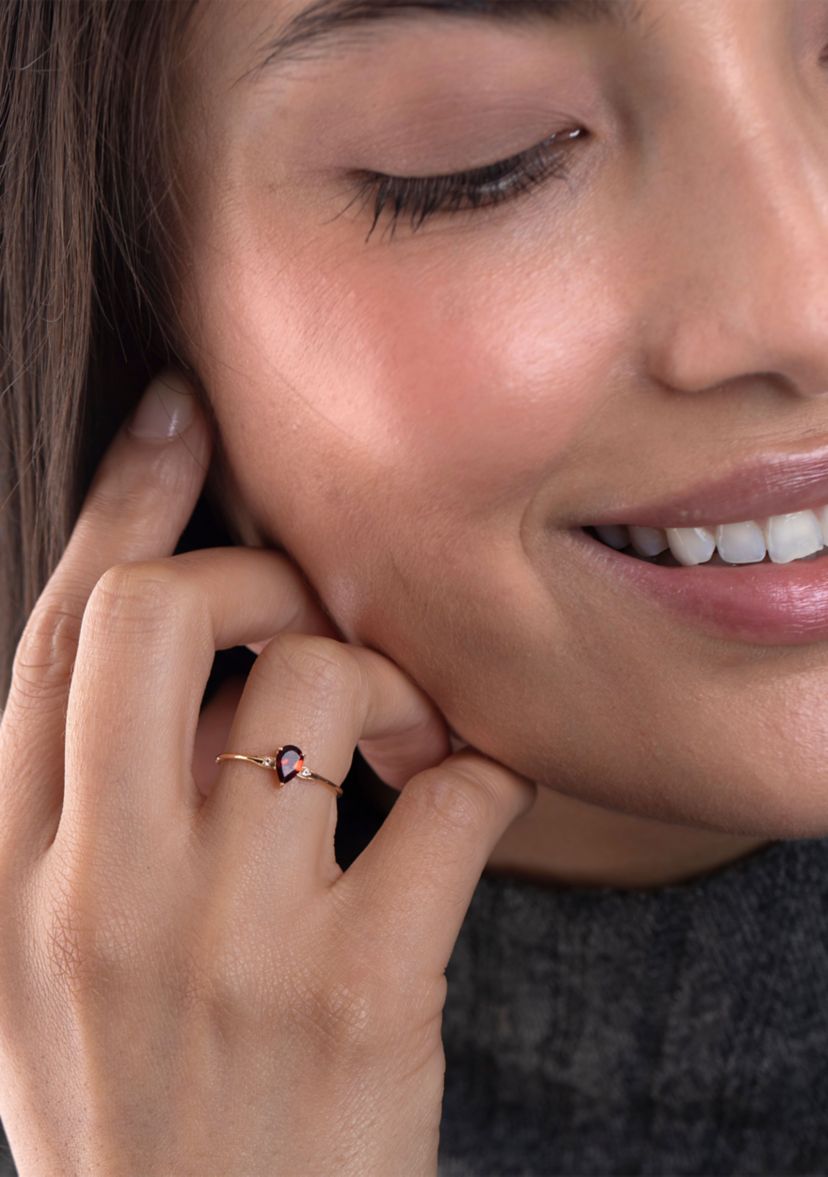 Gold over Sterling Silver Garnet and White Topaz Pear Ring